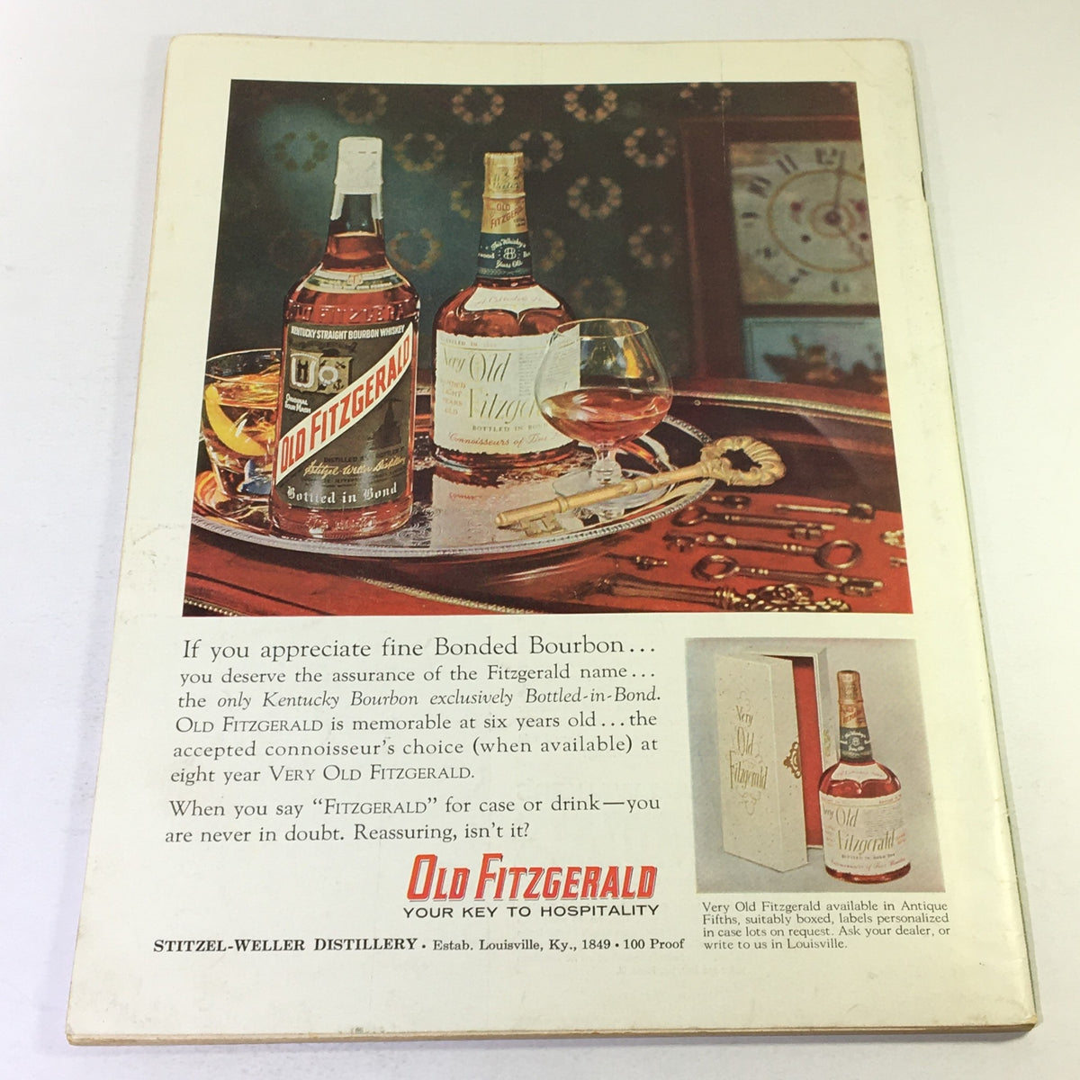 Vintage advertisement featuring Old Fitzgerald bourbon, showcasing bottles and a glass on a tray with antique keys, from VTG Gourmet The Magazine of Good Living October 1960 - The Opera Singer.