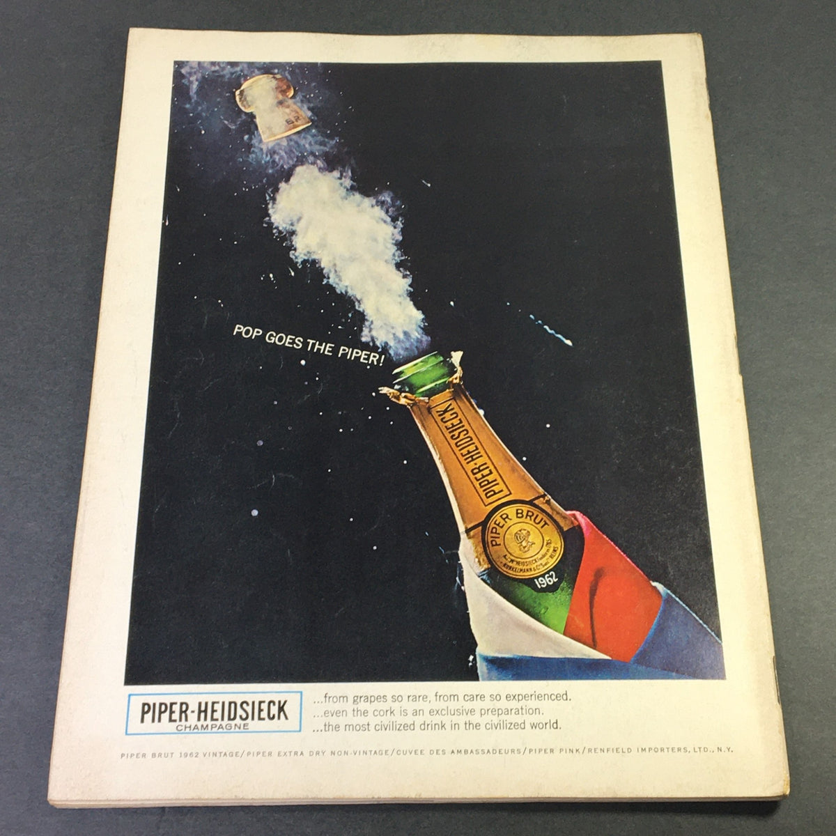 Back cover of VTG Gourmet The Magazine of Good Living June 1968, showcasing a vintage advertisement for Piper-Heidsieck champagne with the text 'Pop Goes The Piper!'