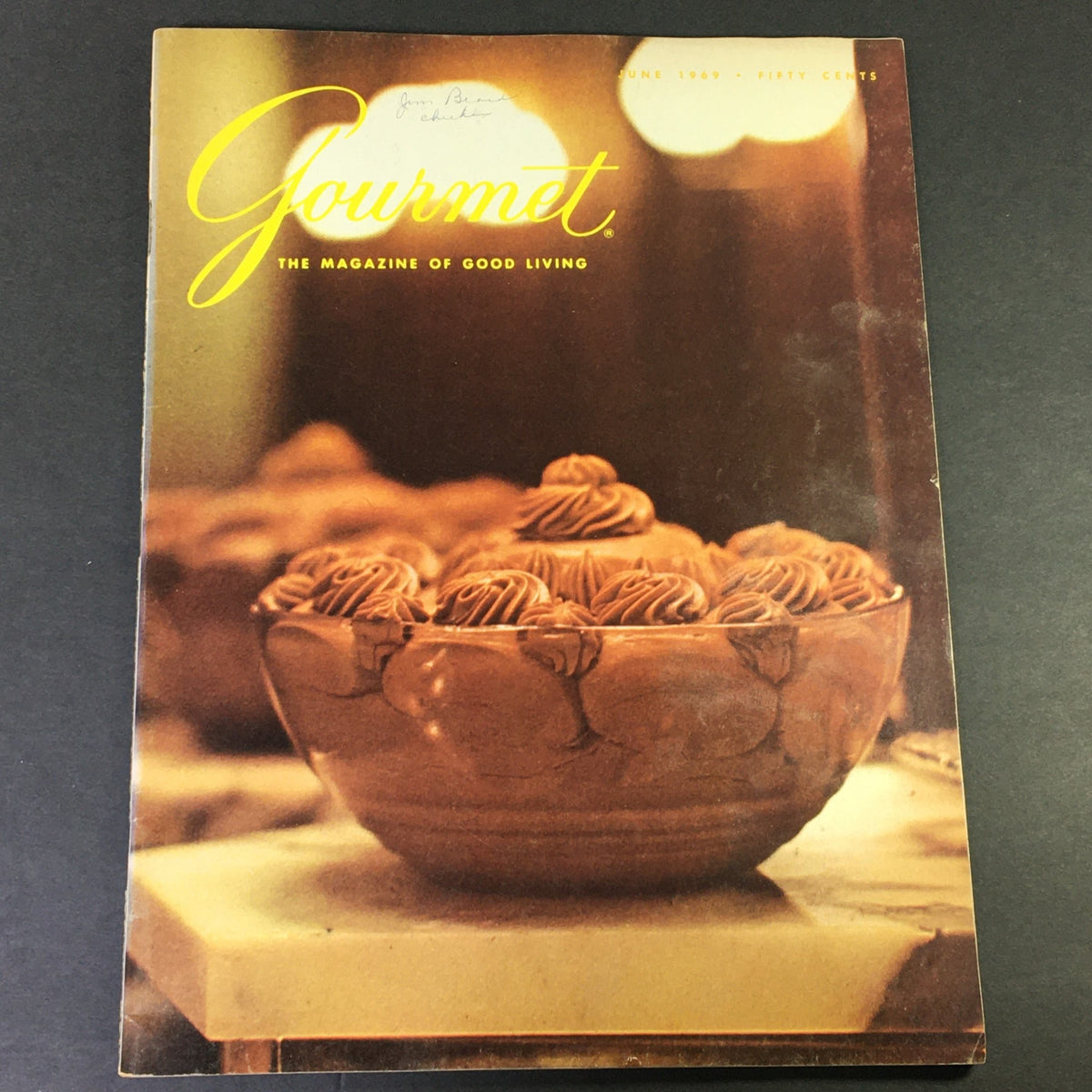 Cover of VTG Gourmet: The Magazine of Good Living, June 1969, featuring a close-up of a silver punch bowl filled with chocolate desserts, evoking nostalgia for mid-century dining elegance.