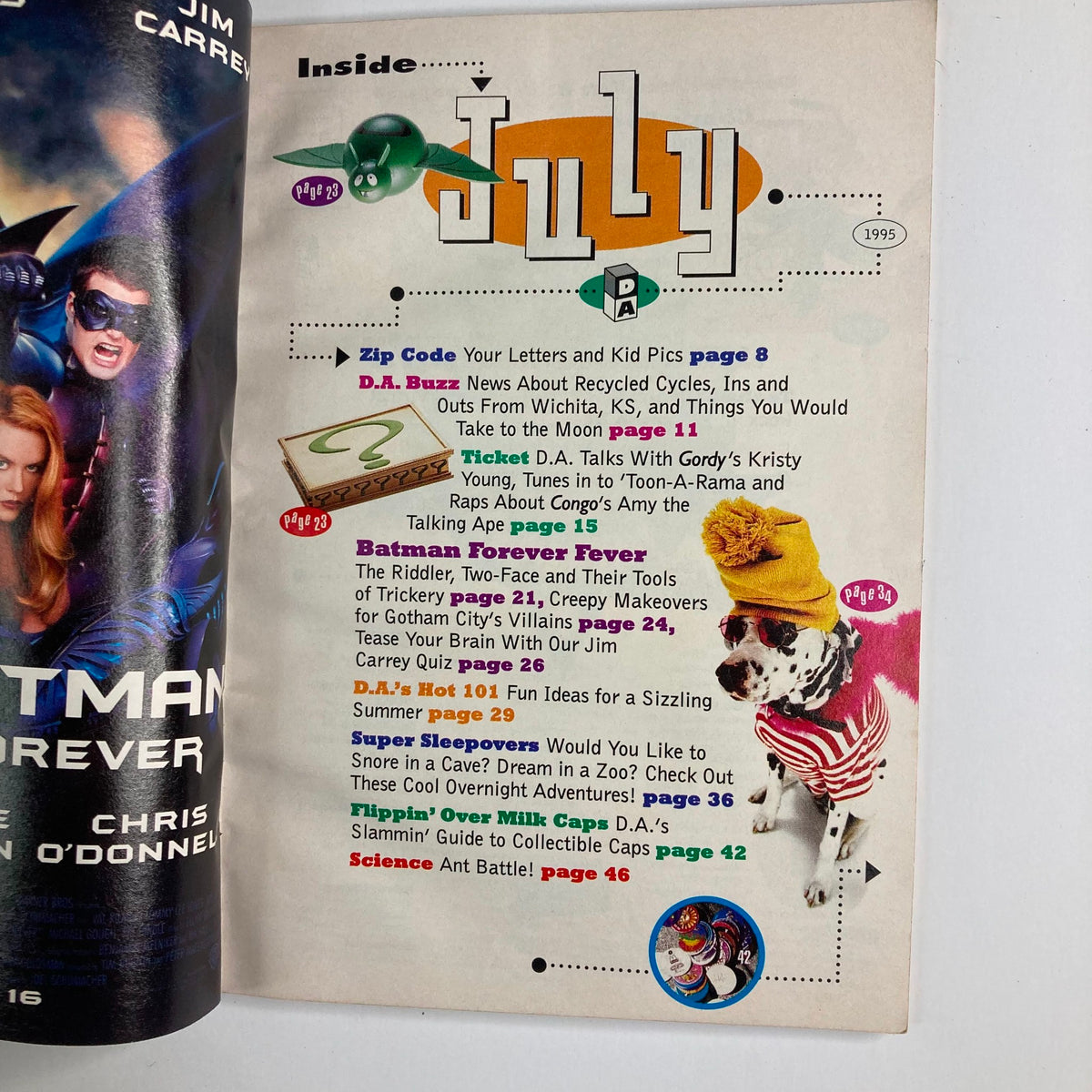 Inside page of Disney Adventures Magazine from July 1, 1995, showcasing a table of contents. Highlights include Batman Forever Fever, letters from kids, fun activities, and featured articles related to Disney and superhero themes.