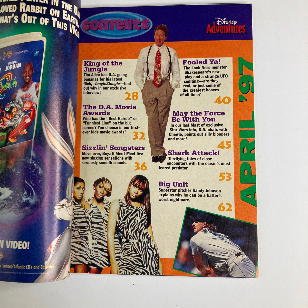 Inside page of Disney Adventures Magazine April 1997, featuring the table of contents. Highlights include articles such as 'King of the Jungle' with Tim Allen, and topics like shark attacks and the D.A. Movie Awards.