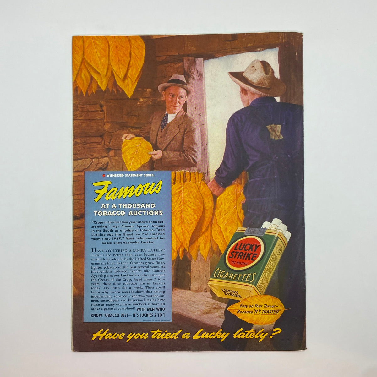 Ad from The New Yorker magazine, August 26, 1939, featuring a colorful advertisement for Lucky Strike cigarettes, showcasing tobacco auction imagery and vintage design elements.