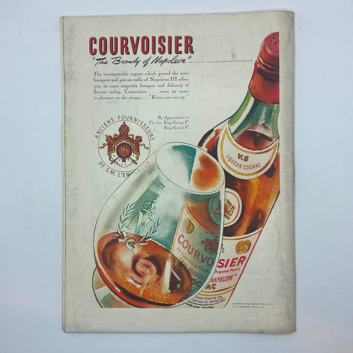 Vintage advertisement for Courvoisier cognac in The New Yorker magazine from October 7, 1939, displaying branding and product details, highlighting its luxurious appeal.