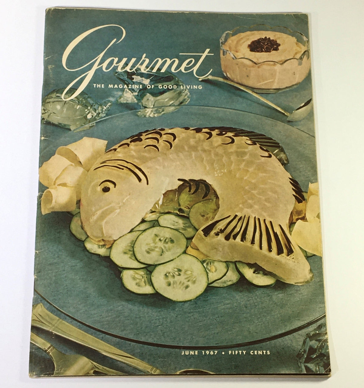 Gourmet The Magazine of Good Living June 1967 cover featuring a decorative fish dish and sliced cucumbers, encapsulating the culinary theme of the issue titled The Wonders of Wales.