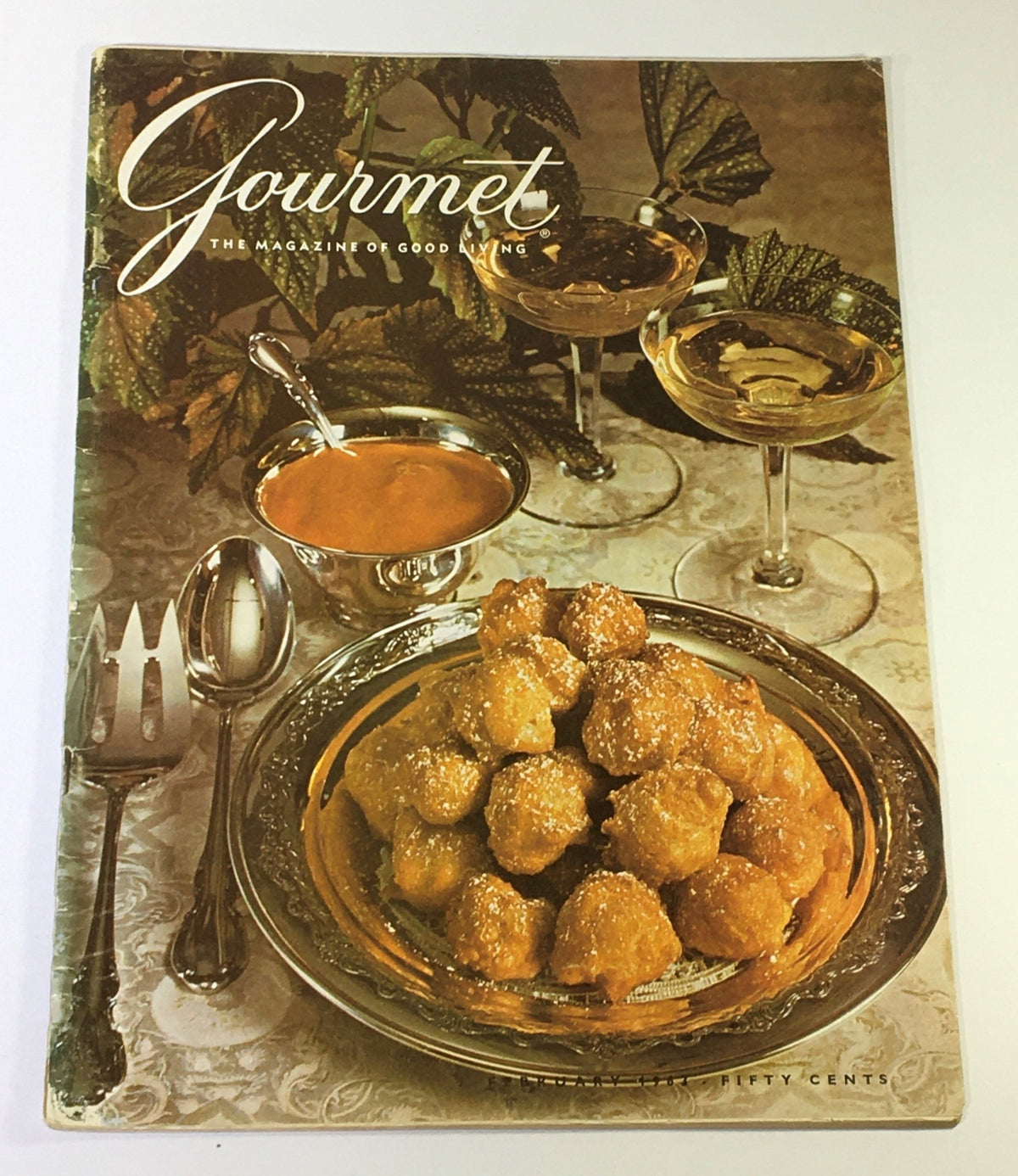 VTG Gourmet The Magazine of Good Living February 1963 - The Beauty of Yorkshire cover featuring a sumptuous spread of dessert and gourmet dish on a silver platter.