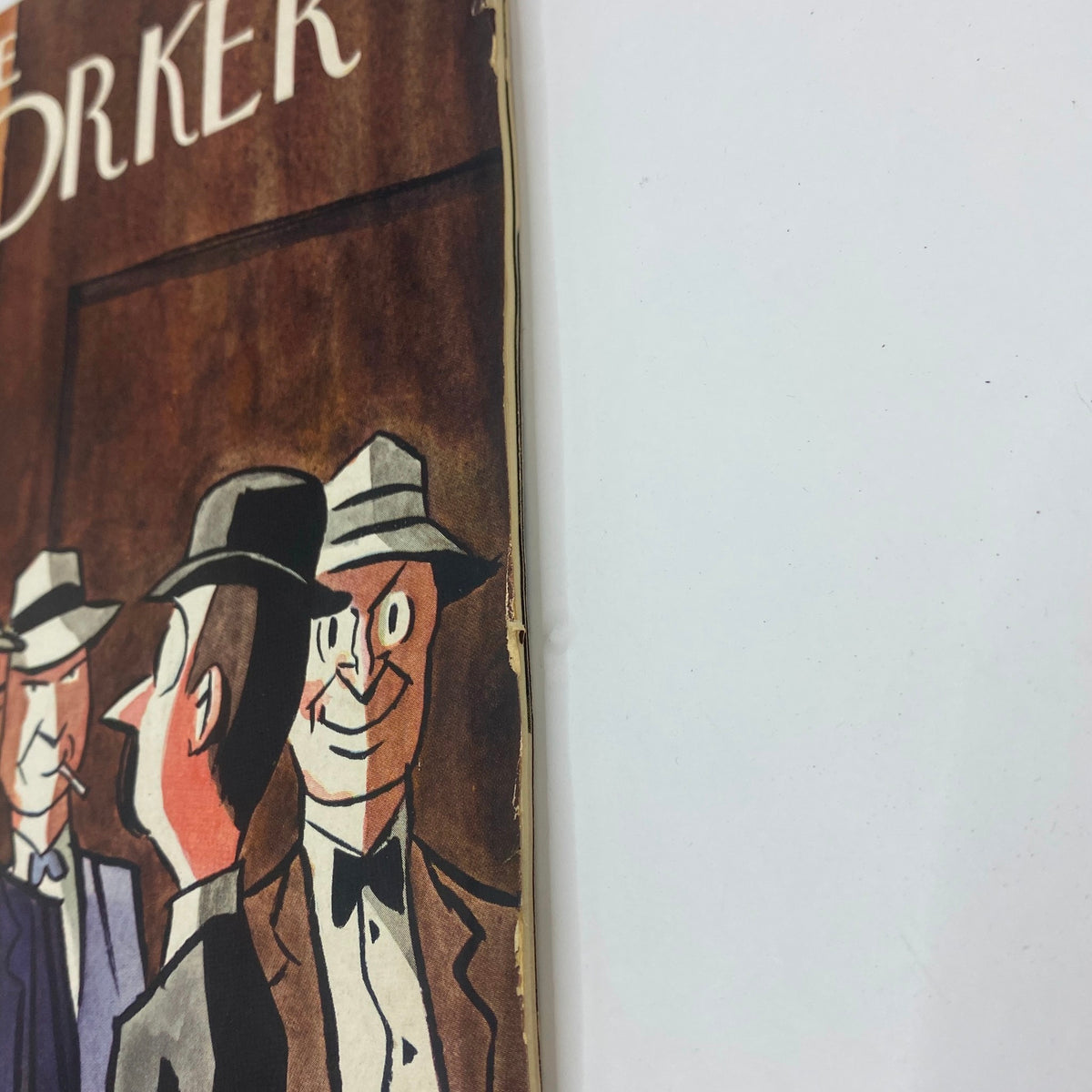 Close-up of The New Yorker Complete Magazine November 2, 1940 Peter Arno Cover featuring stylized characters in hats.
