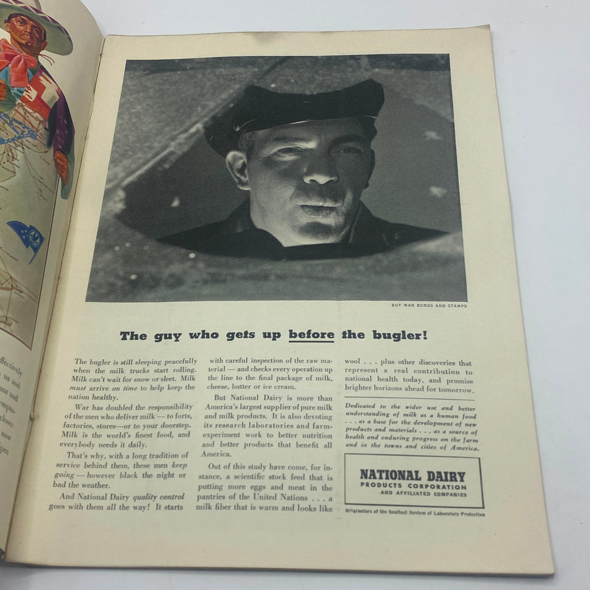 Black and white advertisement from The New Yorker February 20, 1943 issue, featuring a soldier blowing a bugle, promoting National Dairy products with the tagline 'The guy who gets up before the bugler!'.