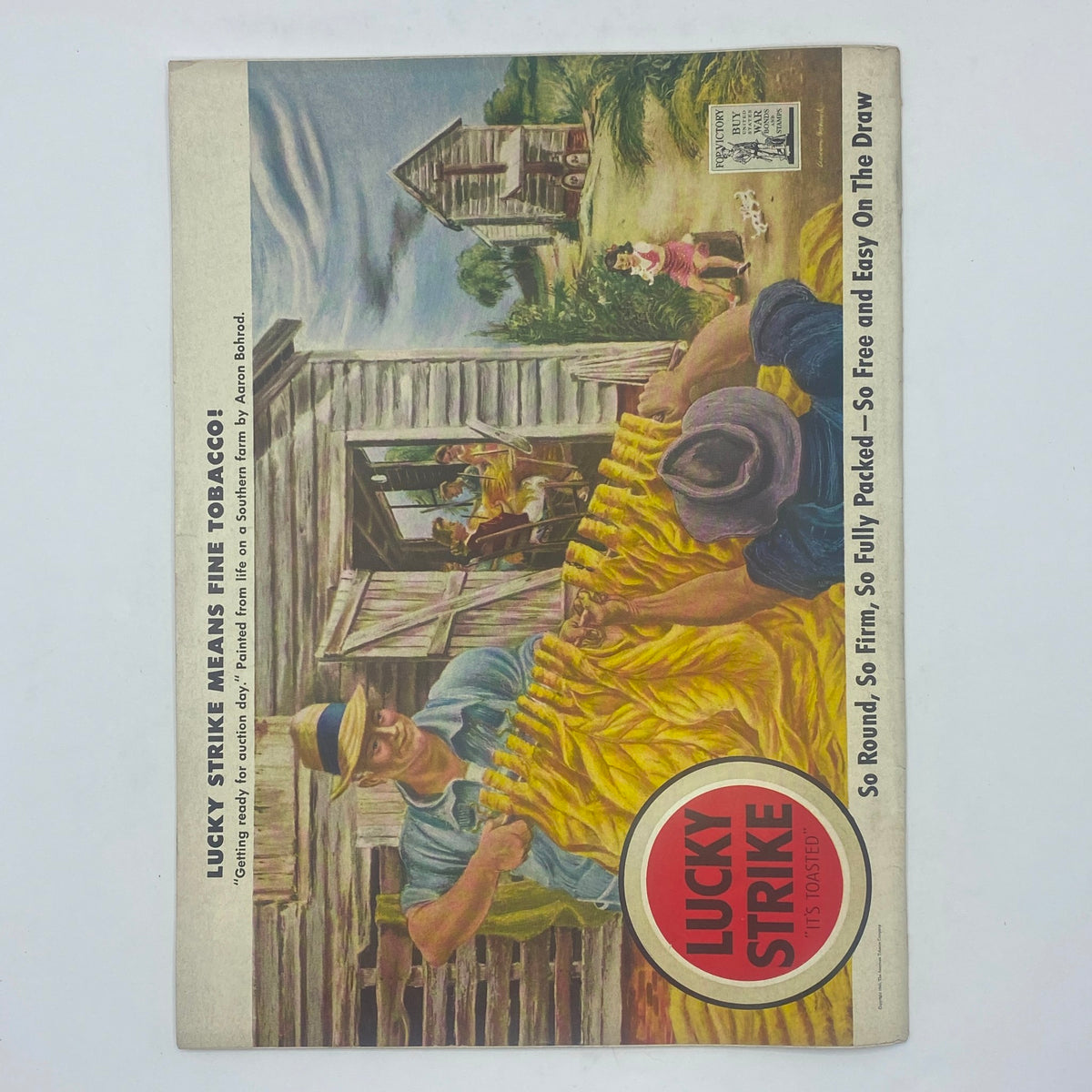 Color advertisement for Lucky Strike tobacco from The New Yorker February 20, 1943 issue, depicting a farmer preparing tobacco with the slogan 'Getting ready for catchin' day'.