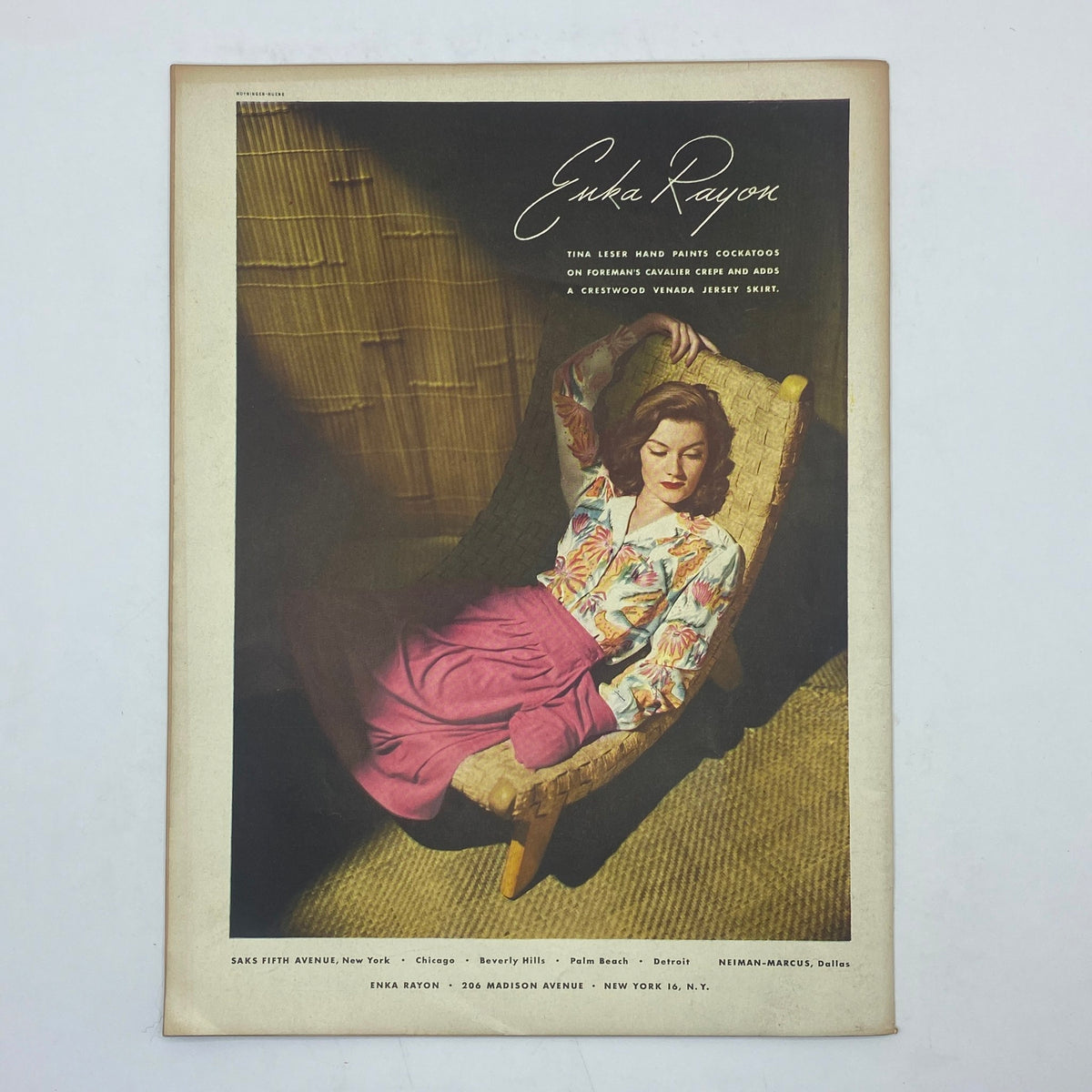 Vintage advertisement showcasing a model wearing Enka Rayon clothing, featured in The New Yorker Complete Magazine January 1, 1944 Peter Arno Cover.