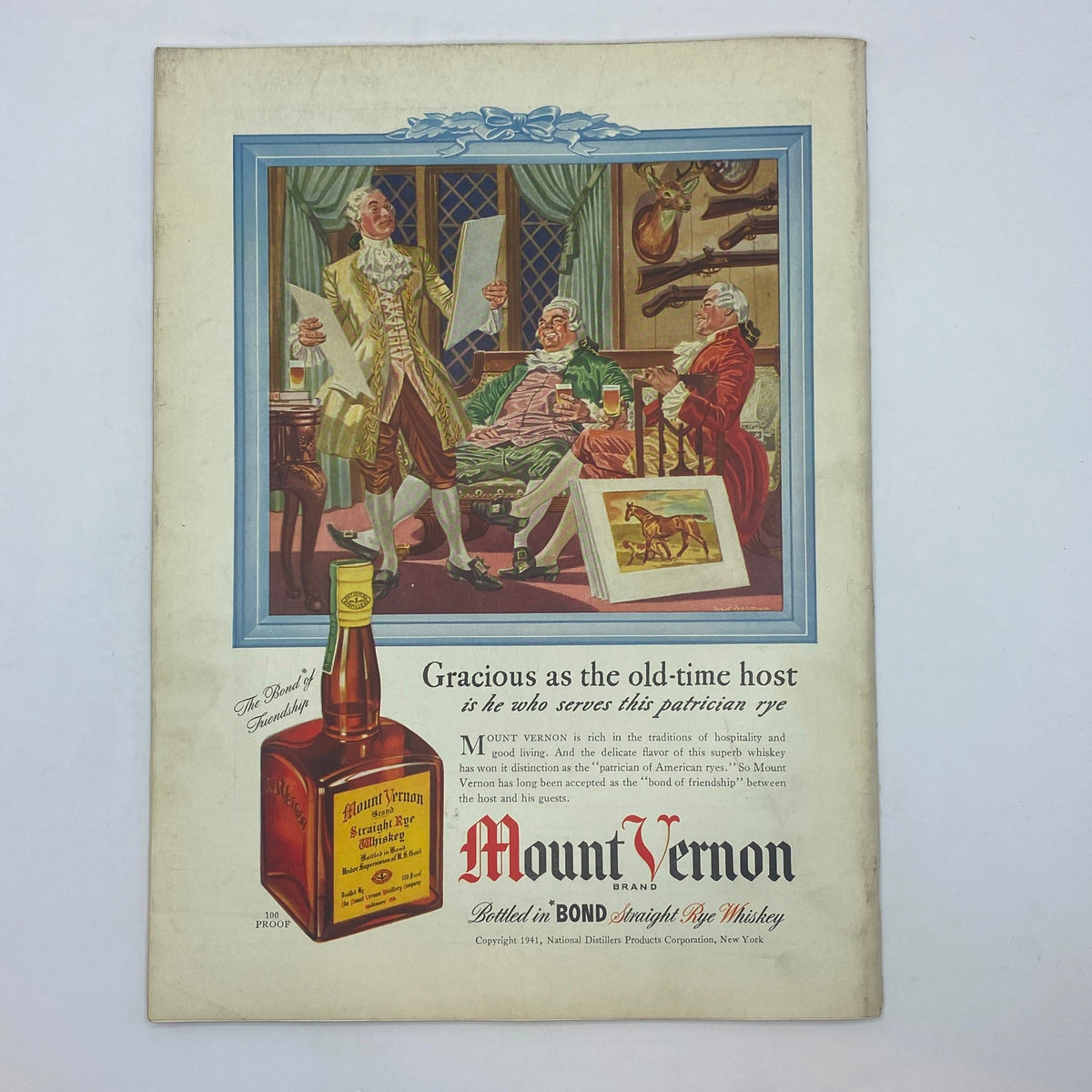 Historical advertisement showcasing a group of gentlemen in a lavish setting discussing whiskey. The illustration highlights Mount Vernon brand whiskey. Featured in The New Yorker Complete Magazine June 21, 1941 Rea Irvin Cover.