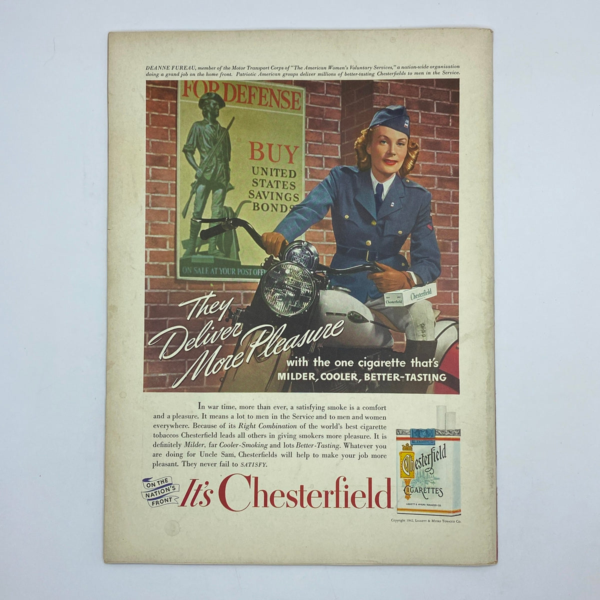 Advertisement from The New Yorker Complete Magazine June 27, 1942, promoting Chesterfield cigarettes with a woman in military attire, highlighting 1940s advertising styles.