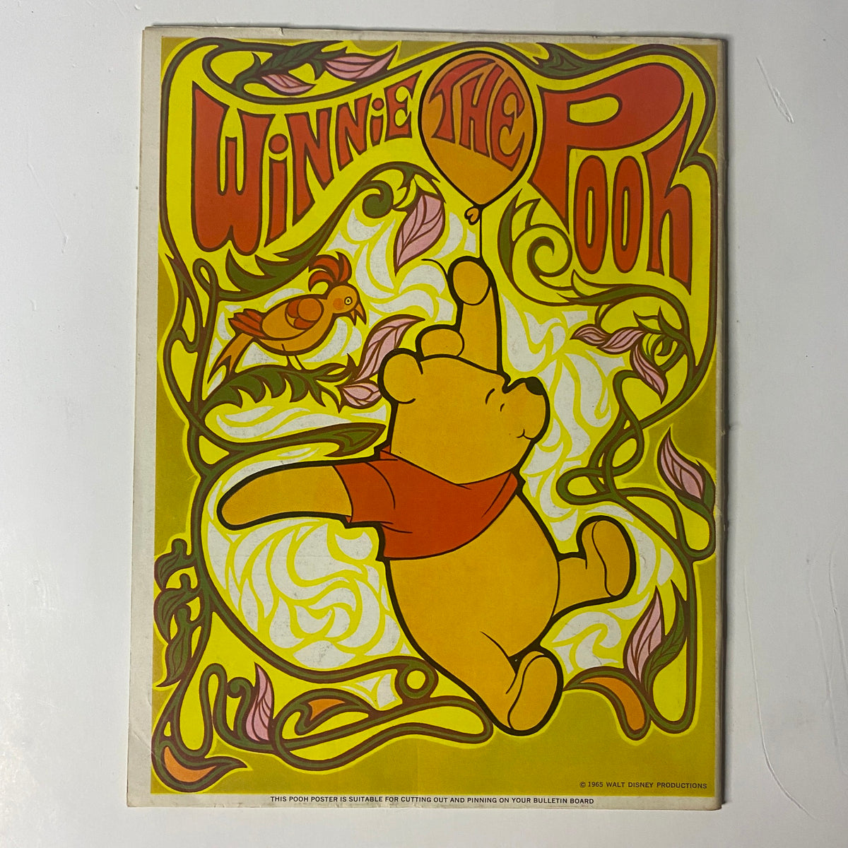 Winnie the Pooh Poster from Wonderful World of Disney Magazine 1969 No. 2, featuring a colorful illustration of Pooh amidst vibrant floral patterns, ideal for collectors and Disneyana enthusiasts.