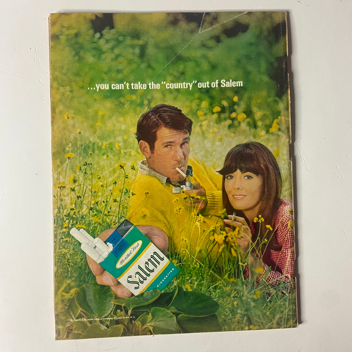 Back cover of a publication from the era, highlighting a retro advertisement for Salem cigarettes, reflecting the style of the late 1960s.