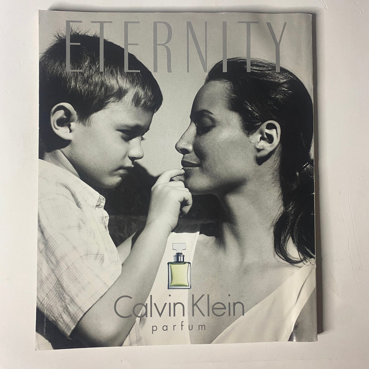 Cover of Eternity by Calvin Klein perfume featuring a child and a woman, unrelated to Martha Stewart Living Magazine June 1997.