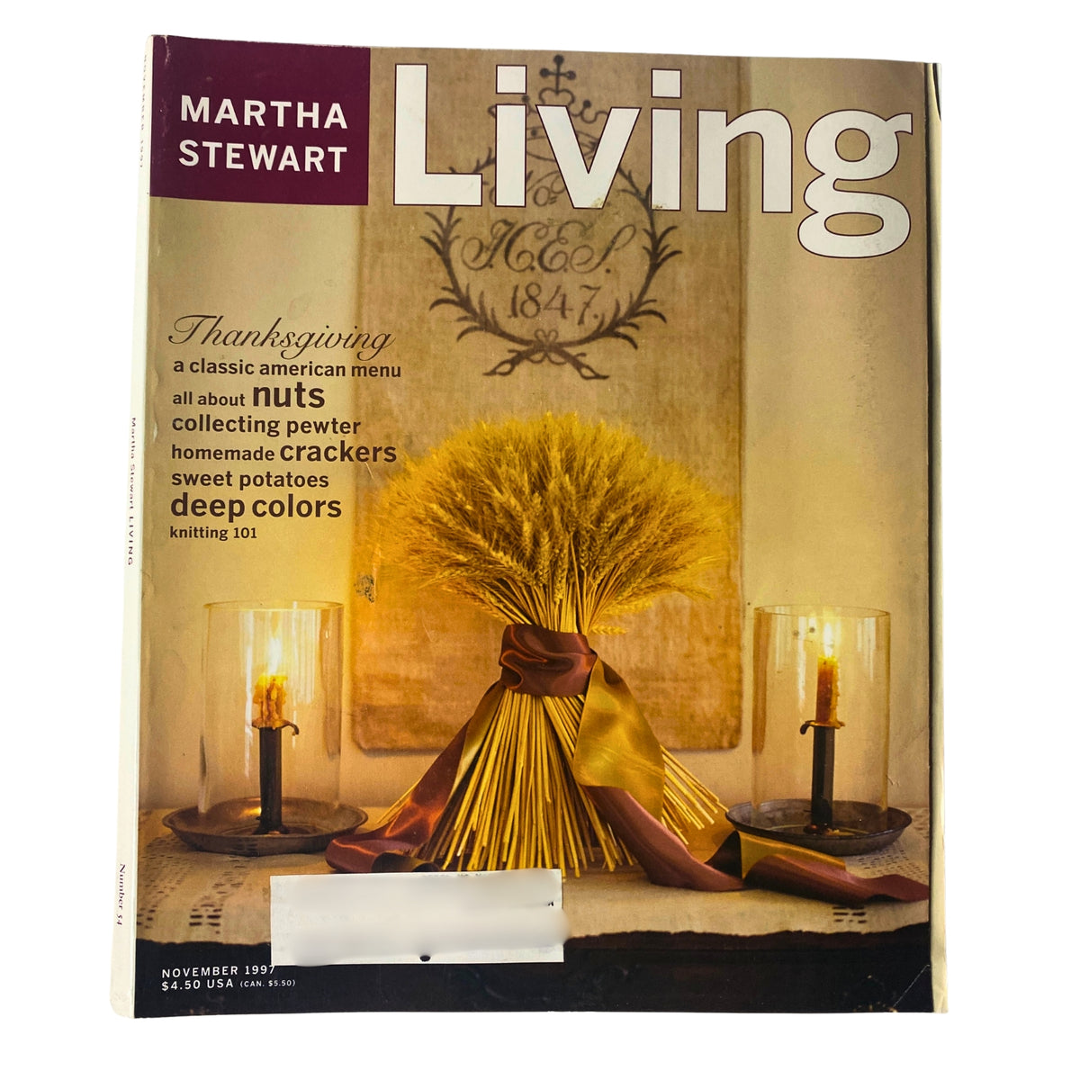 Cover of Martha Stewart Living Magazine November 1997 featuring Thanksgiving classic American menu. The cover showcases a beautiful wheat centerpiece, decorative candles, and hints of holiday recipes including nuts, homemade crackers, sweet potatoes, and deep colors, making it an ideal source for festive inspiration.