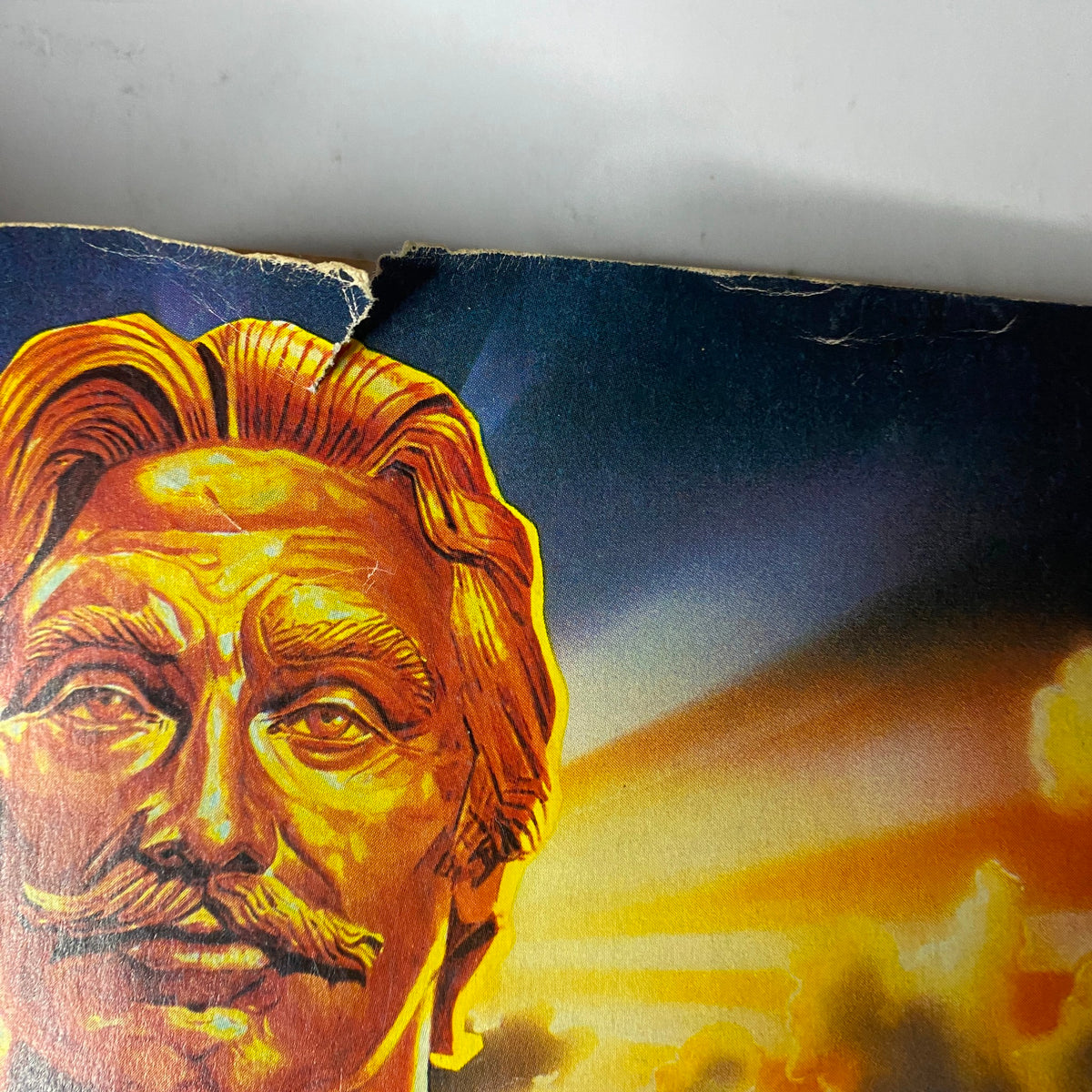 Cover image of Muscle & Fitness Magazine February 1984 featuring a golden illustration of a muscular male figure, representing the theme of strength and bodybuilding, with notable champions Lori Bowen and Frank Zane highlighted in the issue.