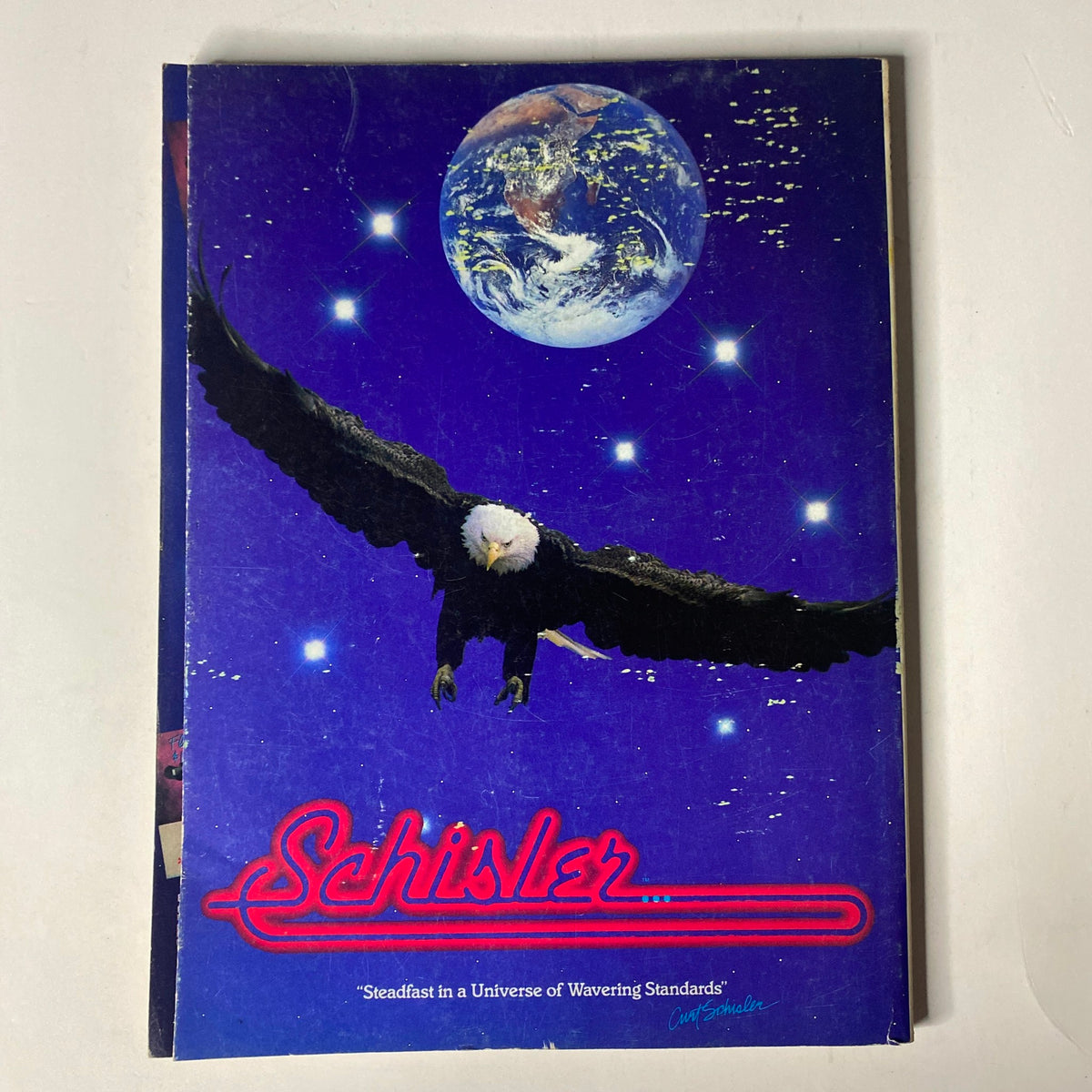 Back cover of Muscle & Fitness Magazine May 1988 with an artistic design featuring a soaring eagle against a starry background.