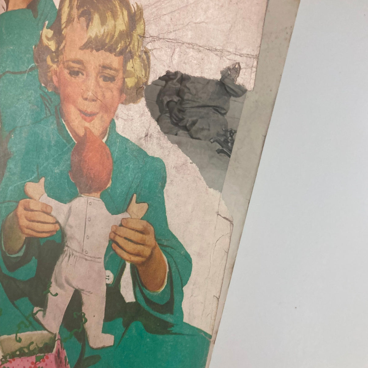 Cover illustration of Ladies' Home Journal Magazine December 1948, showcasing a child holding a doll, highlighting the nostalgic theme of the magazine titled 'Point of No Return'.