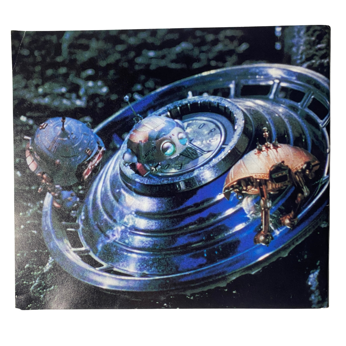 Cinefex Magazine May 1988 No. 34 back cover image showcasing tiny alien saucers from Batteries Not Included, reflecting the magazine's focus on cinematic illusions.