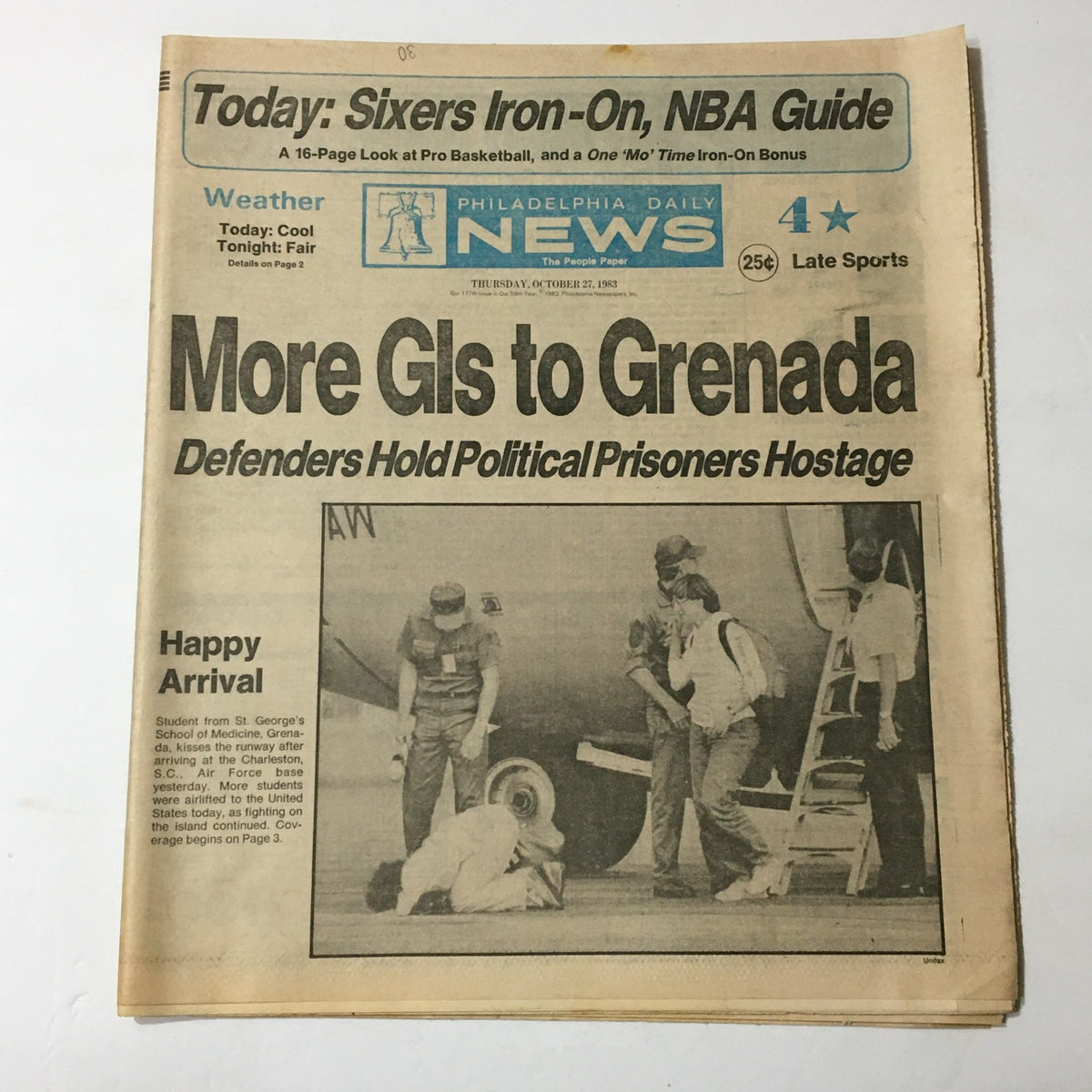 Philadelphia Daily News from October 27, 1983 featuring the headline 'More GIs to Grenada' along with the Sixers Iron-On and NBA Guide, a vintage newspaper capturing historical sports and news from that era.