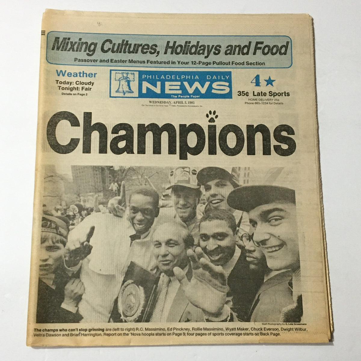 Vintage Philadelphia Daily News cover from April 3, 1985 featuring R.C. Massimino, Ed Pinckney, and Wyatt M. celebrating their championship victory. The headline reads 'Champions', capturing a significant moment in sports history.