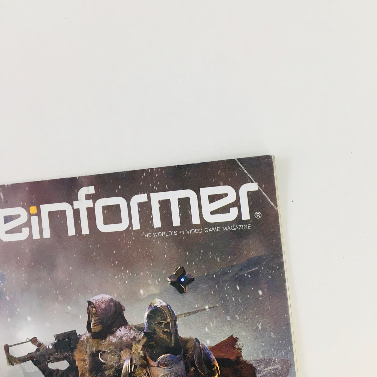 Close-up of the Game Informer Magazine September 2016 Issue 281 logo, showcasing its title and branding related to Destiny: Rise of Iron.