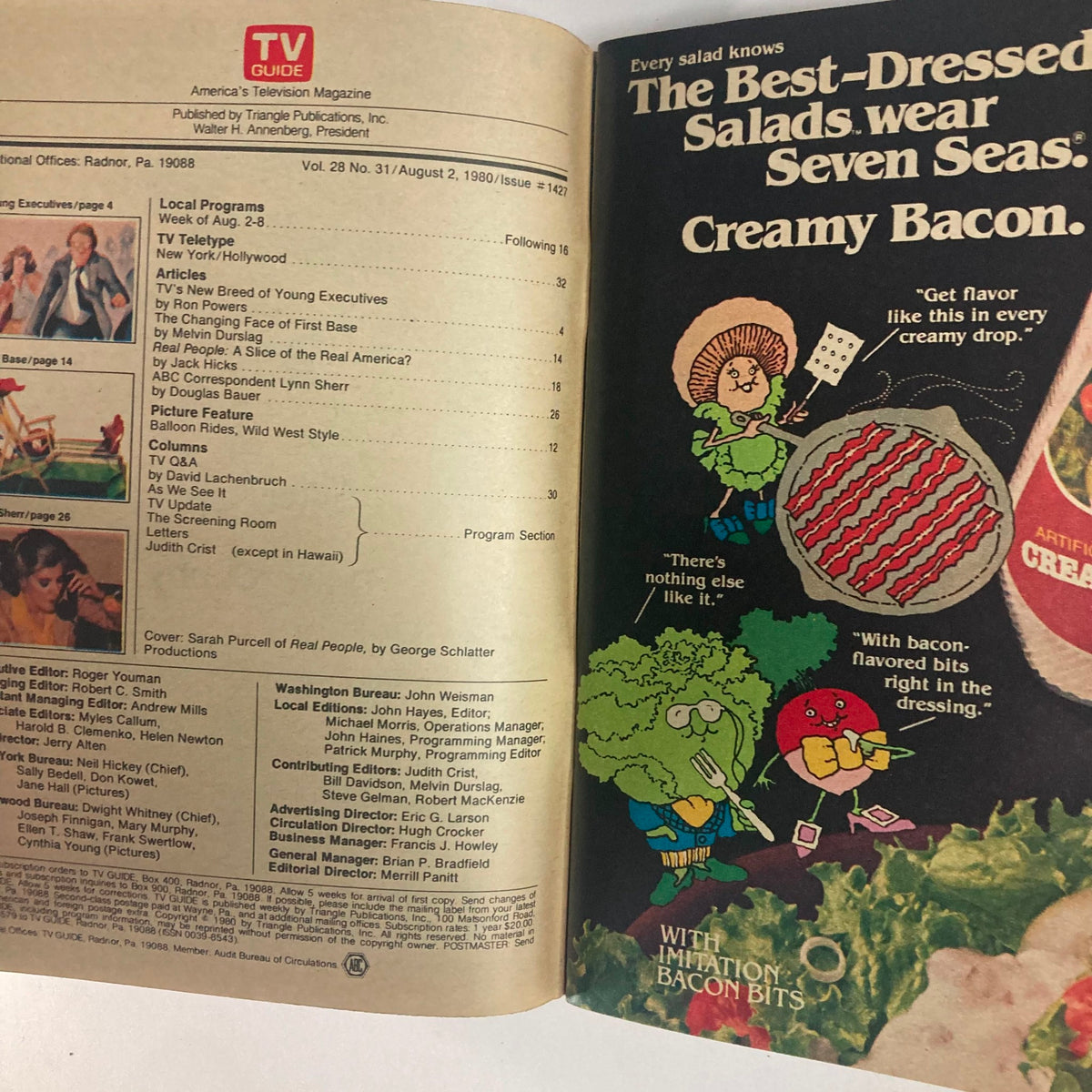 Interior page of TV Guide Magazine August 2, 1980, issue number #1427, featuring colorful illustrations and advertisements, including a humorous take on salad dressings with cartoon characters promoting Seven Seas Creamy Bacon dressing.