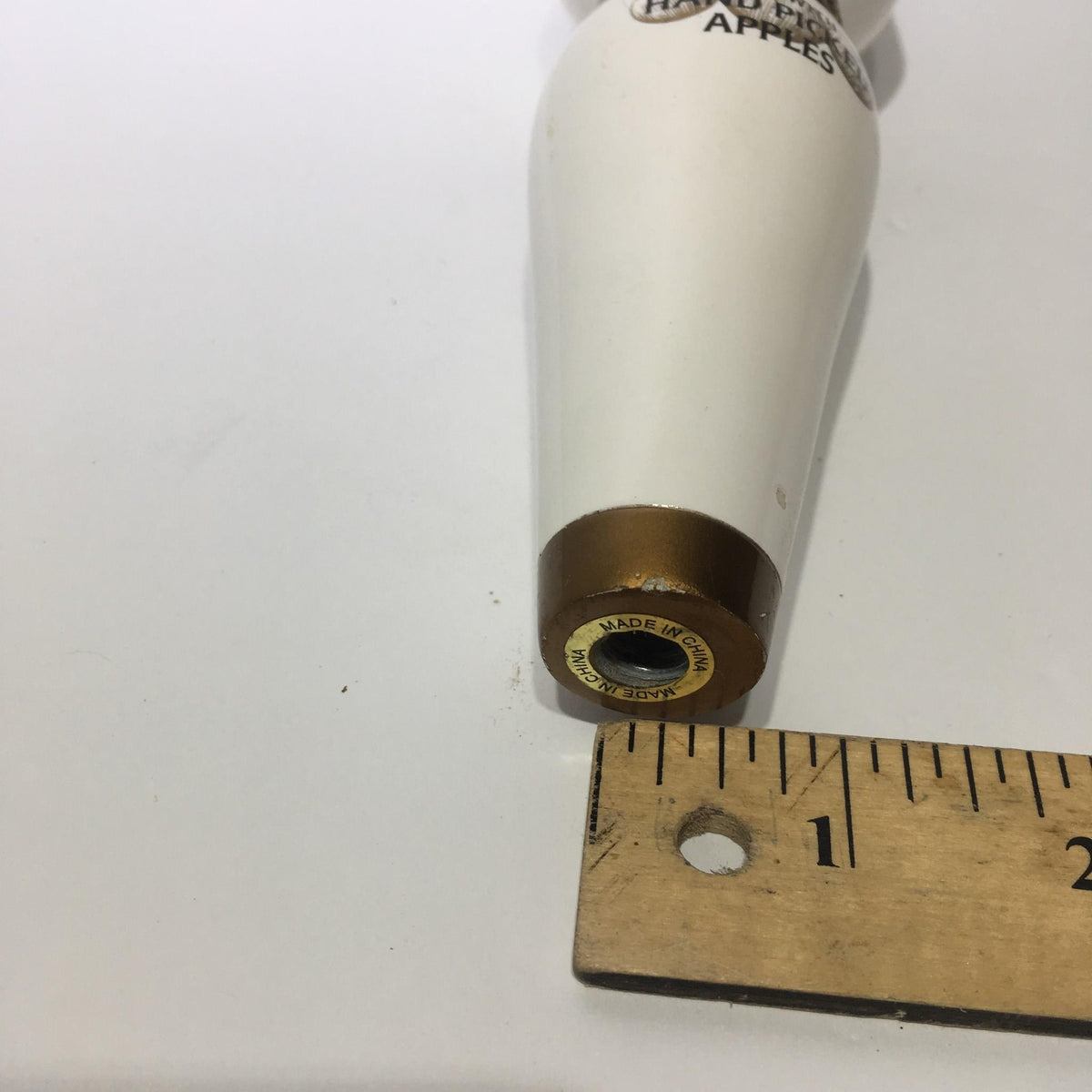 Close-up of the base of a Vintage Stella Artois Cidre 10" Beer Tap Handle showing the manufactured details.