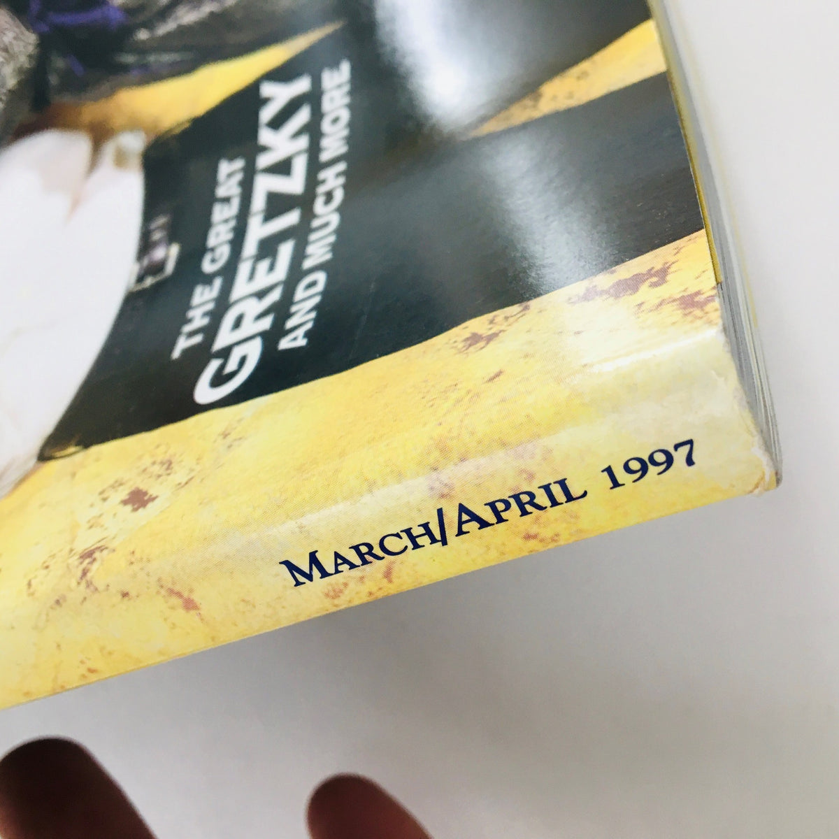 Spine view of Cigar Aficionado Magazine March 1997 showing the publication date.