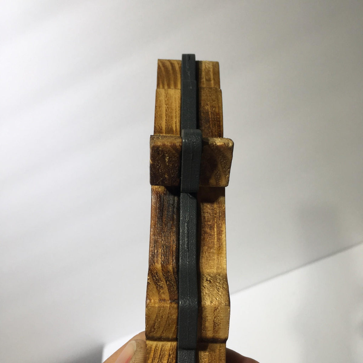 Side view of the Vintage Dogfish Head 60 Minute IPA 12" Beer Tap Handle, highlighting the craftsmanship and layered materials.