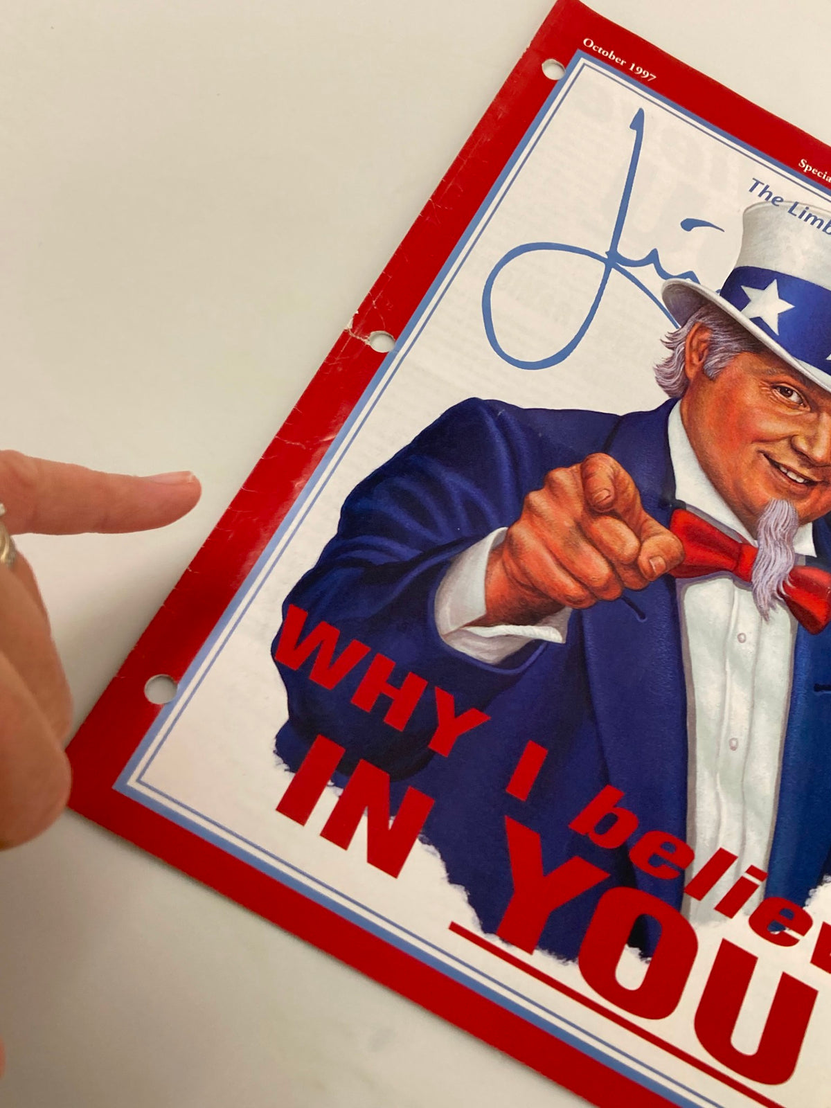 Close-up of the cover of the Rush Limbaugh Letter Newsletter October 1997 issue titled 'Why I Believe You', highlighting the signature of Rush Limbaugh alongside his image in a patriotic context.
