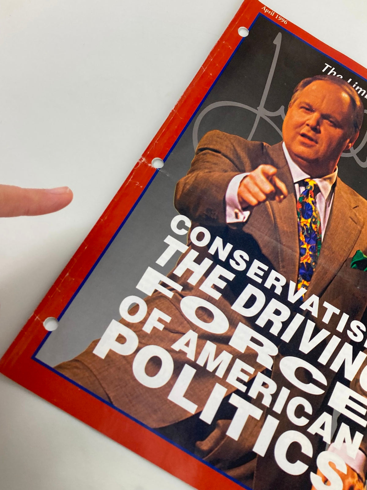 Close-up of the cover of Rush Limbaugh Letter Newsletter Magazine April 1996, highlighting the title 'Conservatism: The Driving Force of American Politics' along with light wear and hole punches indicative of its vintage nature.
