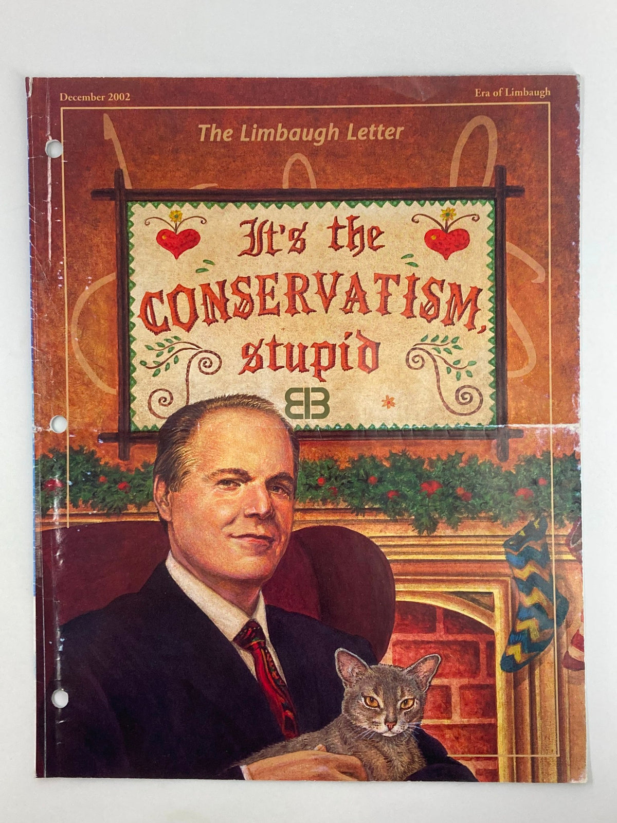 Cover of Rush Limbaugh Letter Newsletter Magazine December 2002 titled 'It's the Conservatism Stupid', featuring a portrait of Rush Limbaugh with a cat, surrounded by festive decorations.