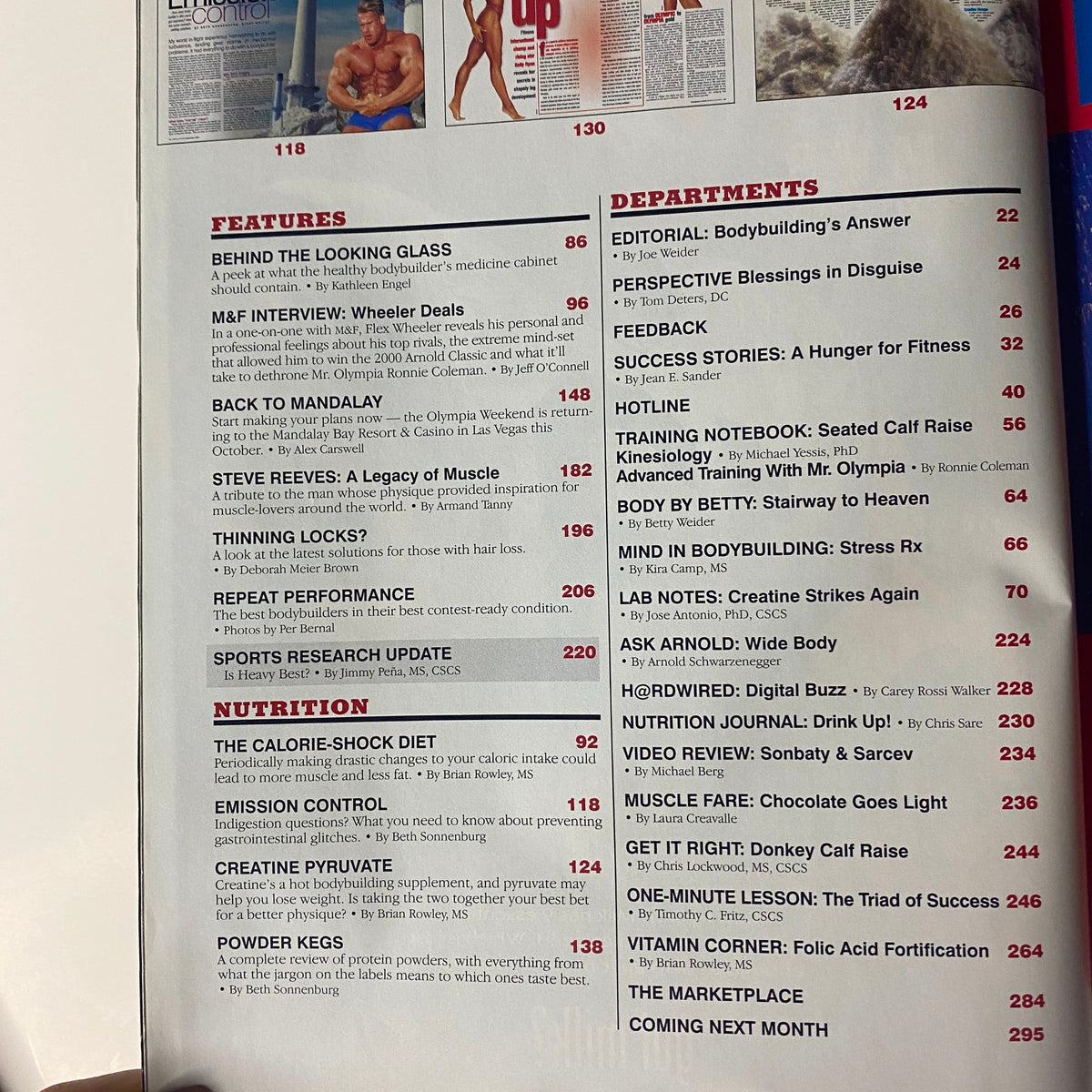 Page from Muscle & Fitness Magazine September 2000 (Vol 61 No 9) featuring articles including 'Behind the Looking Glass', 'M&F Interview: Wheeler Deals', and 'Sports Research Update'. The magazine includes various department listings and highlights.