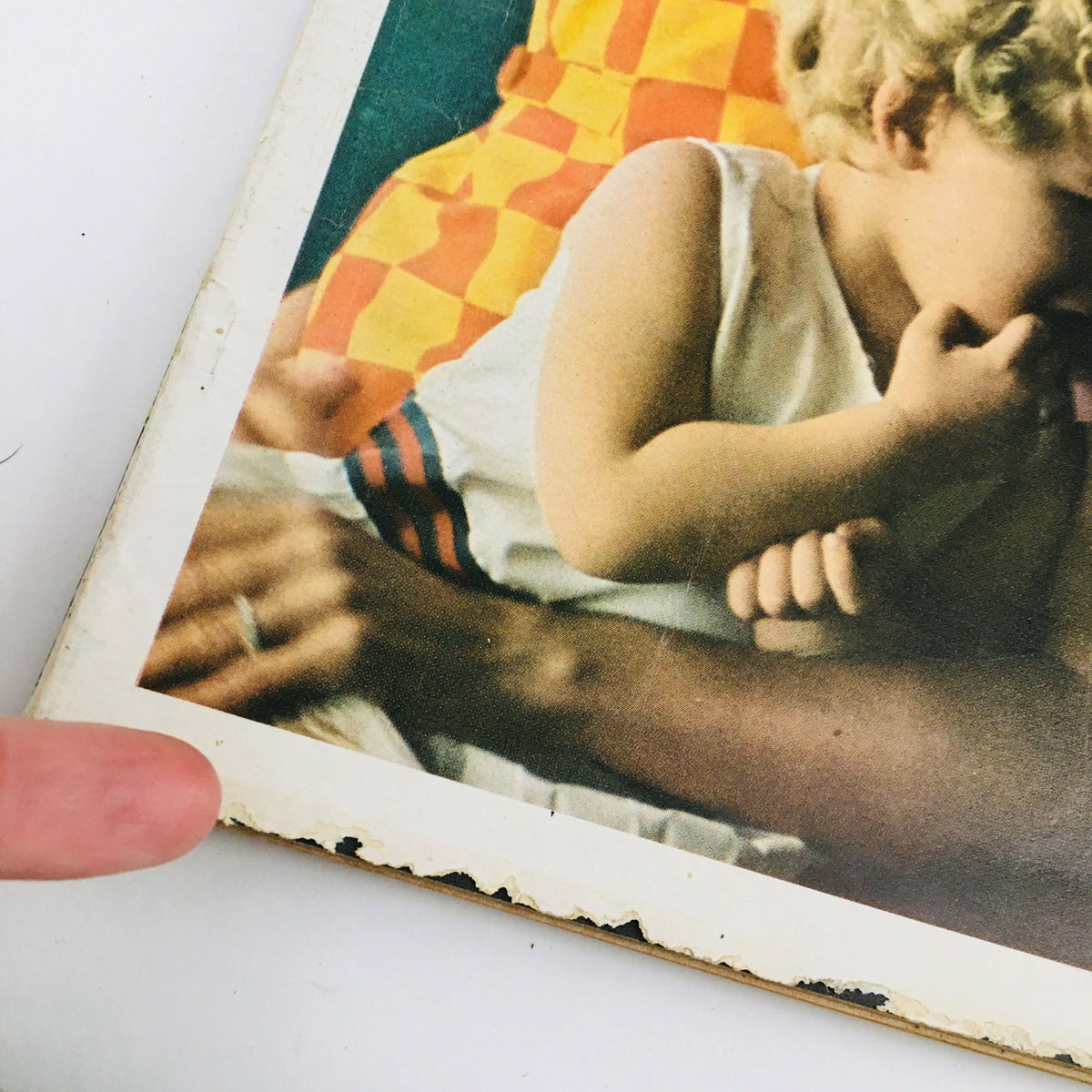 Close-up of the bottom edge of Redbook Magazine June 1967, showing minor wear and tear.
