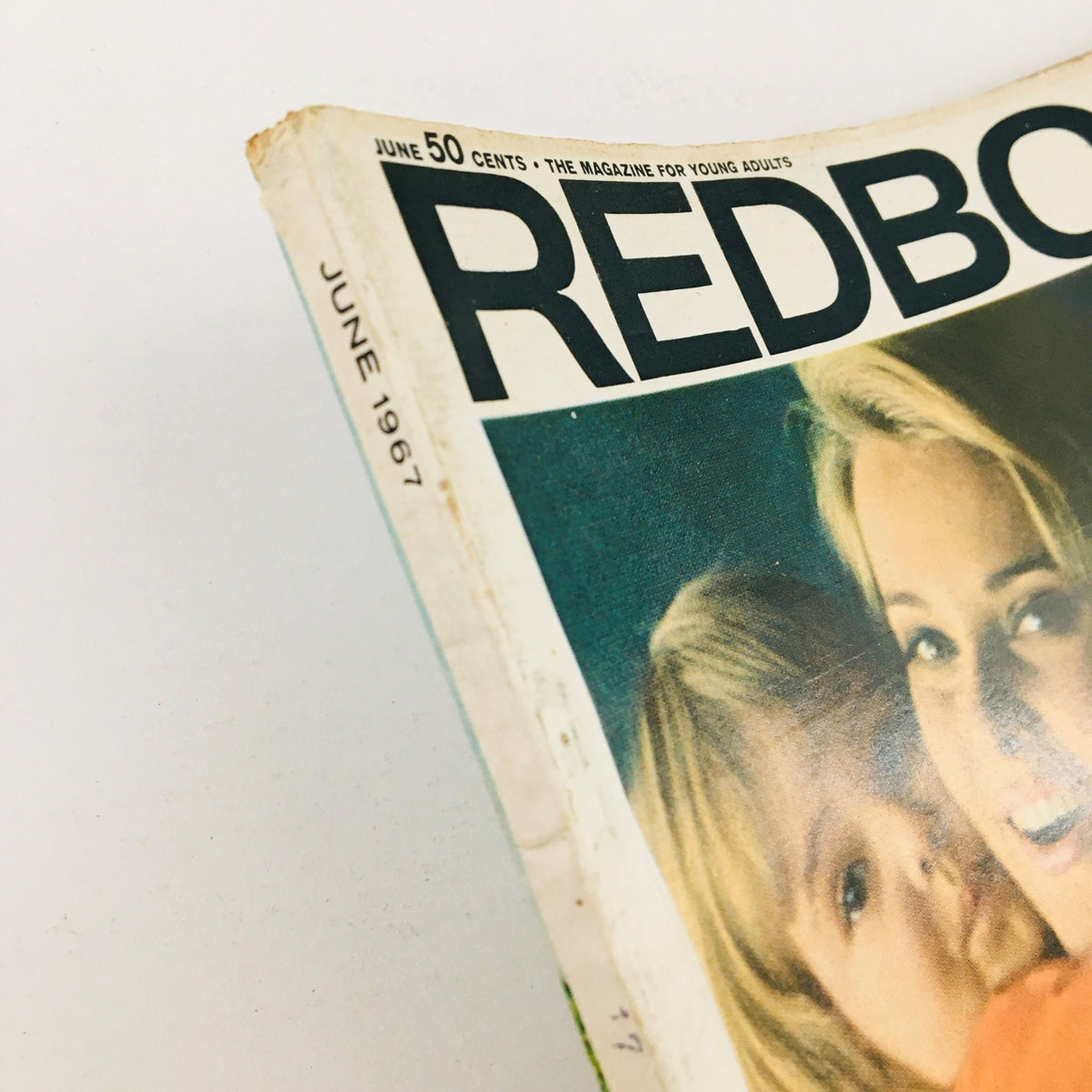 Cover of Redbook Magazine June 1967 featuring a smiling woman with long blonde hair and a child, encapsulating themes of beauty and motherhood. This issue includes insights from Sophia Loren on what it means to be beautiful.