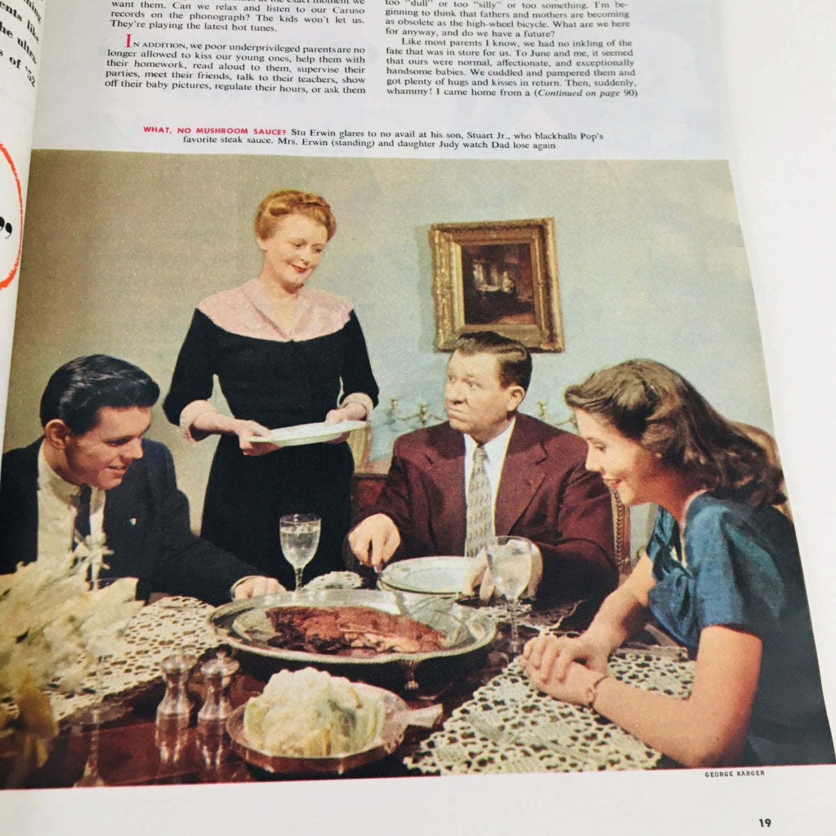 The American Magazine June 1952, How To Get Along In The Army by Curt Simmons, featuring a vintage family dinner scene with a woman serving food to men at the table.