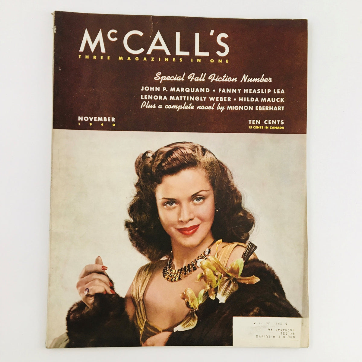 Cover of the vintage McCall's Magazine from November 1940 featuring authors John P. Marquand and Fanny Heaslip Lea, showcasing a glamorous model and classic design.