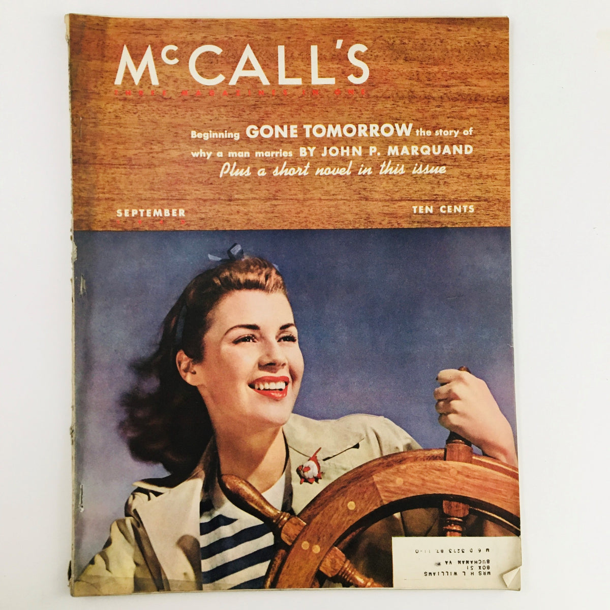Cover of VTG McCall's Magazine September 1940 titled 'Gone Tomorrow: The Story of Why Man Marries', featuring a smiling woman at a ship's wheel.