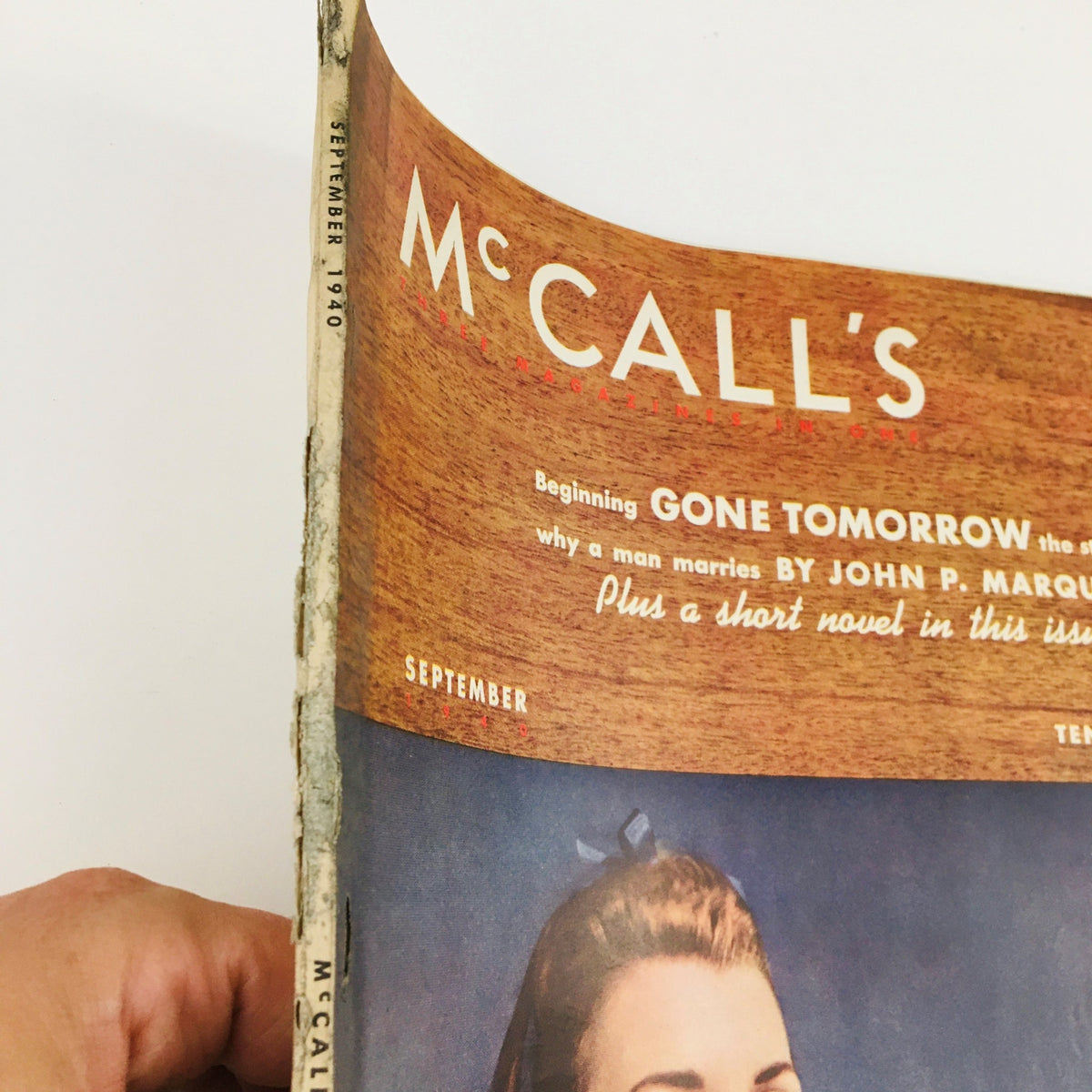 Side view of VTG McCall's Magazine September 1940 cover with title 'Gone Tomorrow: The Story of Why Man Marries', highlighting the magazine's vintage design.