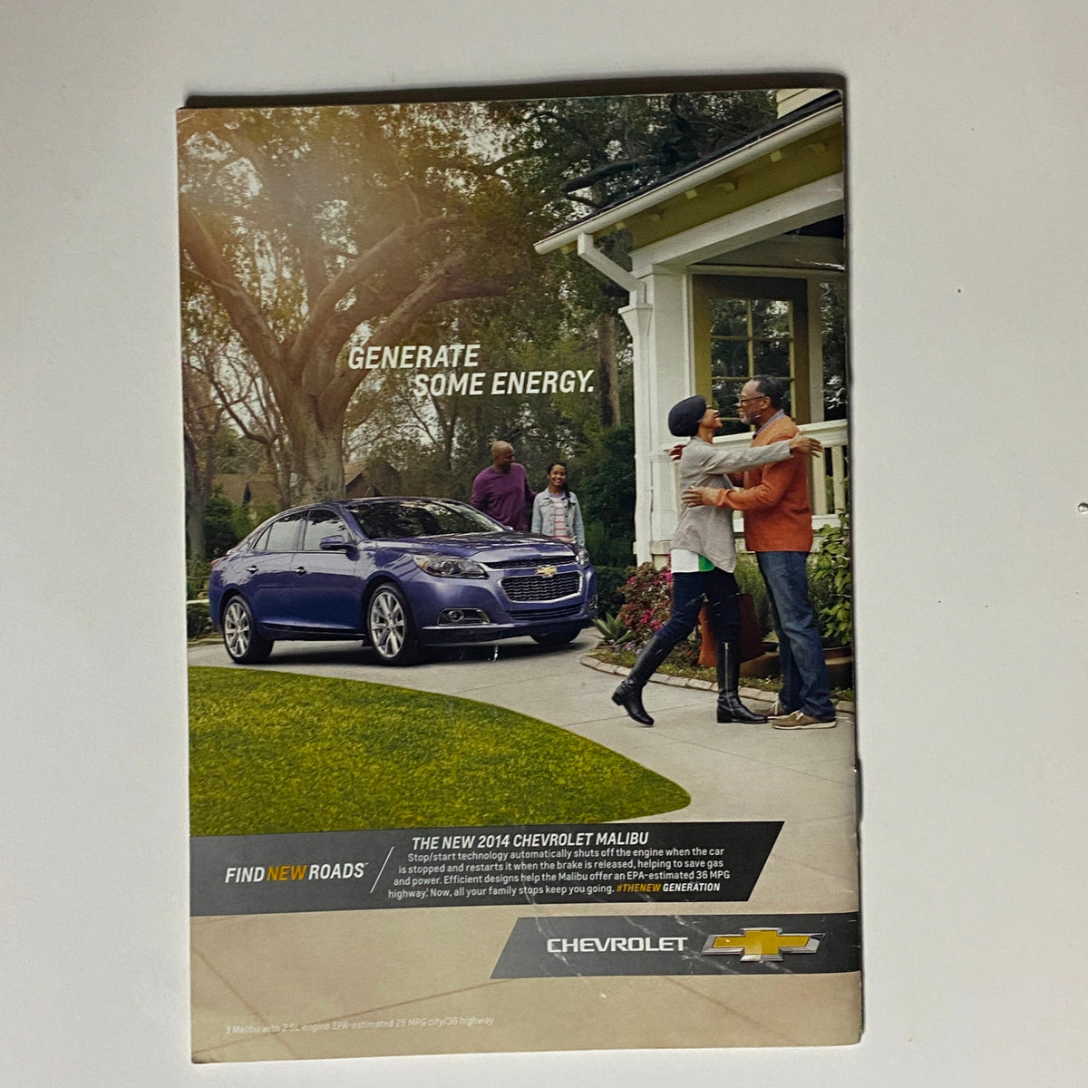Advertisement page from Jet Magazine June 2, 2014, Vol 123 No. 8 for the 2014 Chevrolet Malibu, depicting a family scene in a suburban setting.