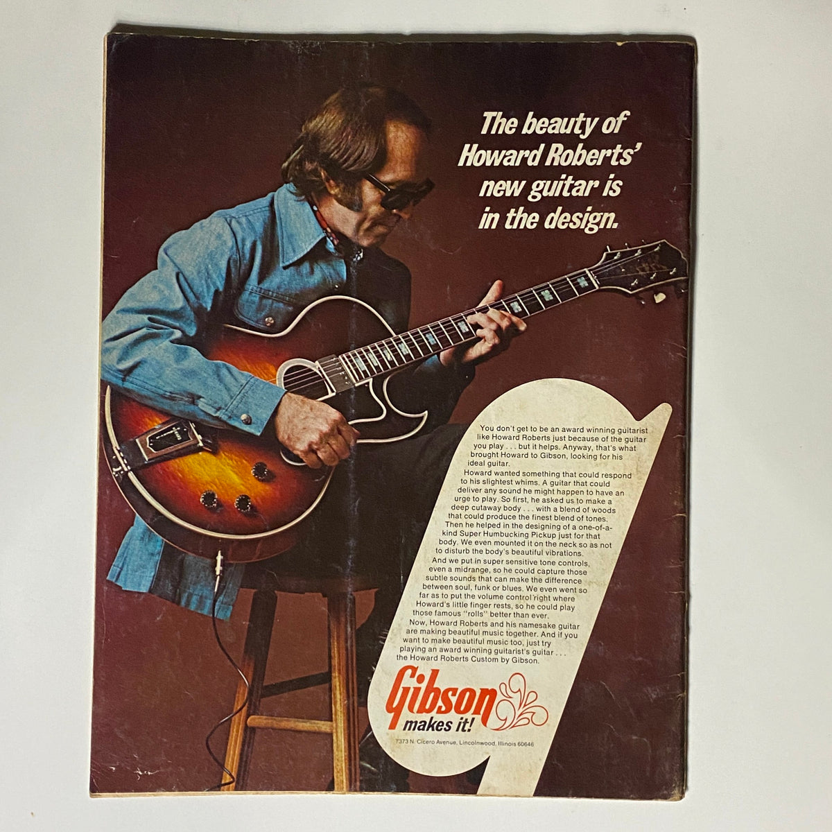 Back cover of VTG Guitar Player Magazine April 1974 Vol 8 No 4 showcasing Howard Roberts playing his guitar with an advertisement for Gibson guitars.