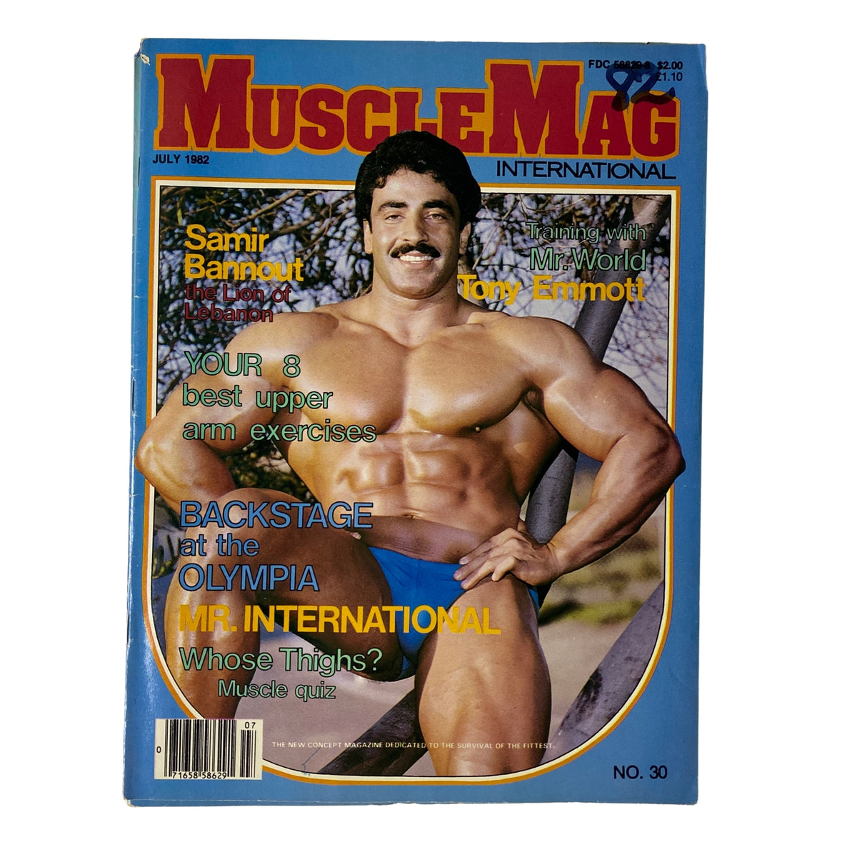 Cover of MuscleMag International Magazine July 1982 No. 30 featuring Samir Bannout, showcasing bodybuilding aesthetics and articles on upper arm exercises, Mr. International, and backstage coverage of the Olympia.