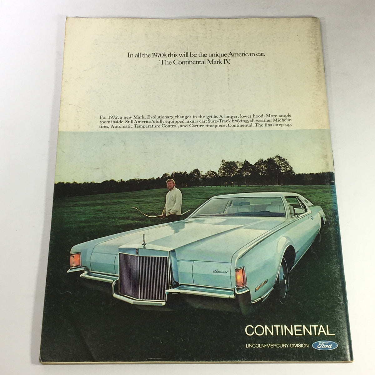Back cover of VTG Gourmet The Magazine of Good Living October 1971 featuring an advertisement for the Continental Mark IV, with a classic car and a man holding a bow, reflecting the stylish lifestyle of the 1970s.