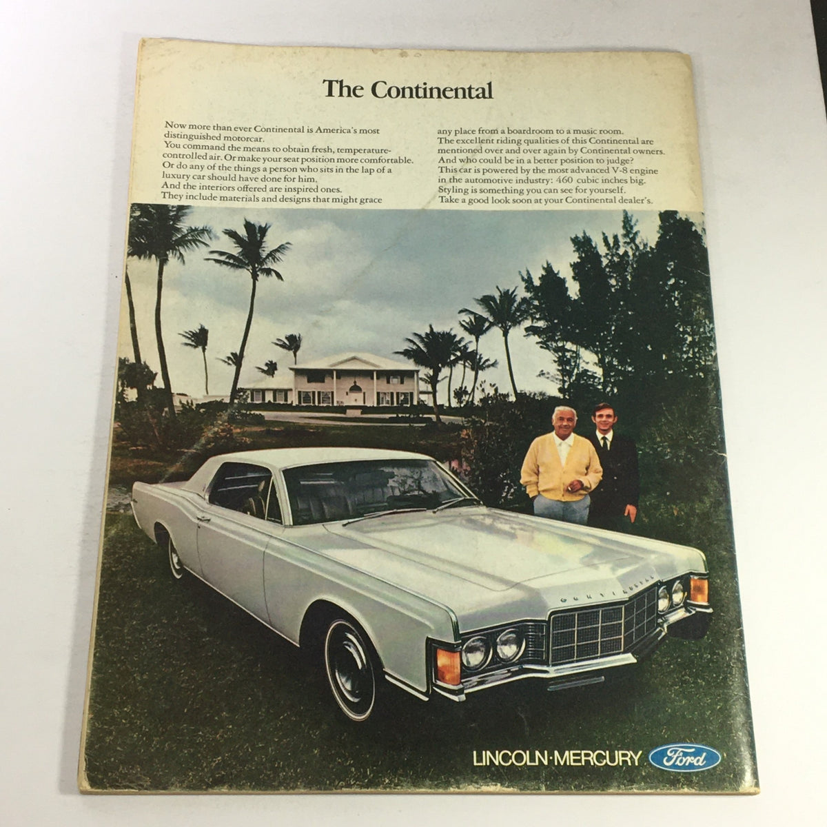 Back cover of VTG Gourmet The Magazine of Good Living June 1969 showcasing a Lincoln Continental car with two men standing beside it, surrounded by palm trees.