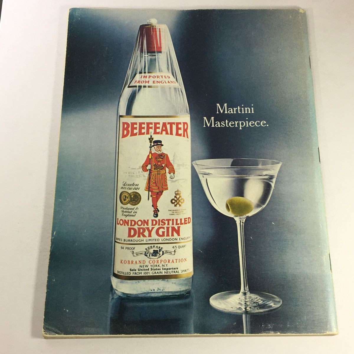 Interior page of VTG Gourmet The Magazine of Good Living June 1977 showcasing Beefeater Dry Gin advertisement with a martini, emphasizing gourmet drinks and lifestyle.