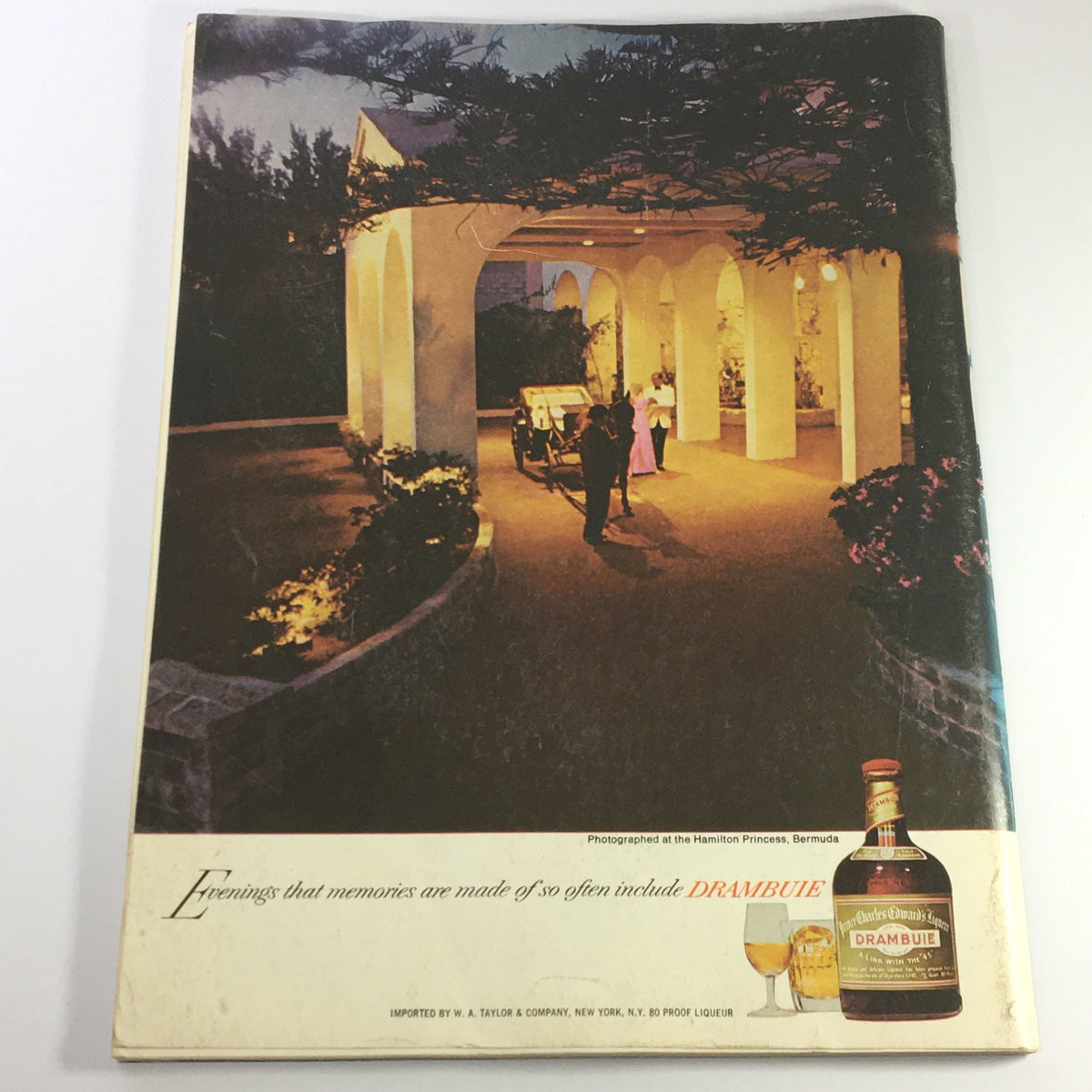 Back cover of VTG Gourmet The Magazine of Good Living May 1976 showcasing an elegant evening scene with guests at a venue in Bermuda.