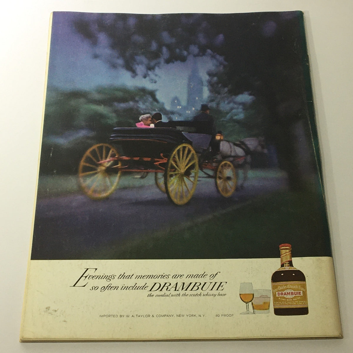 Back cover of VTG Gourmet The Magazine of Good Living September 1973 showcasing a nostalgic image of a horse-drawn carriage with the tagline about Drambuie, enhancing the magazine's vintage charm.