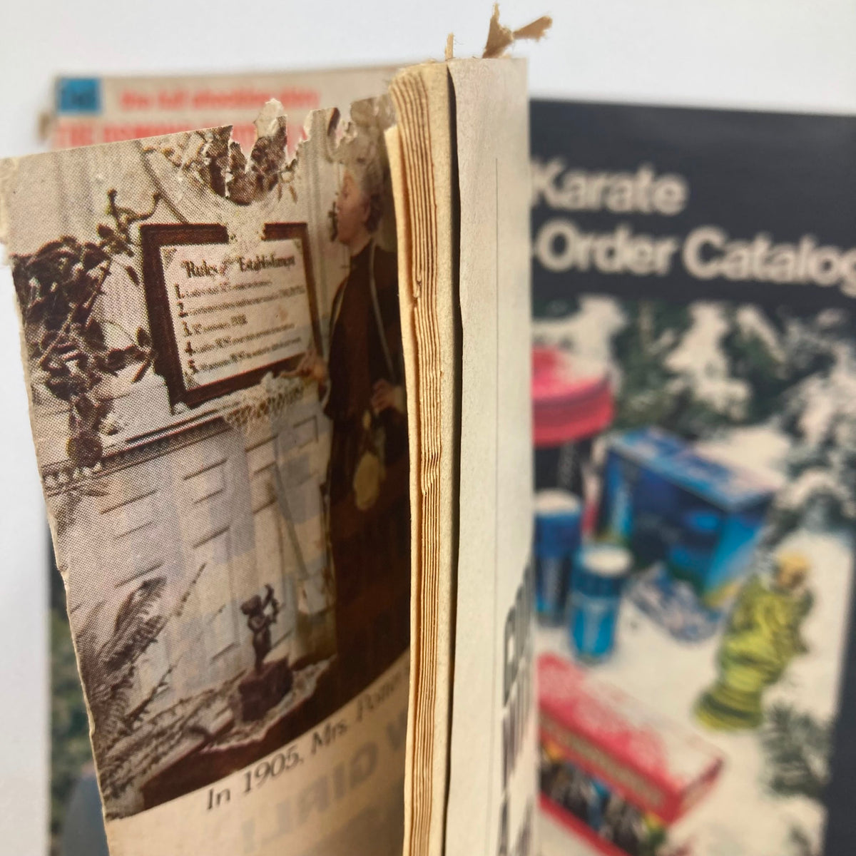 Close-up image of the spine of the Modern Screen magazine December 1973, highlighting age-related wear and tear, showcasing its vintage character and authenticity