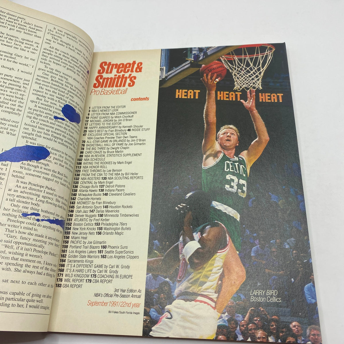 Inside page of Street & Smith's Pro Basketball Magazine 1991-1992 displaying the contents section with Larry Bird in action for the Boston Celtics.